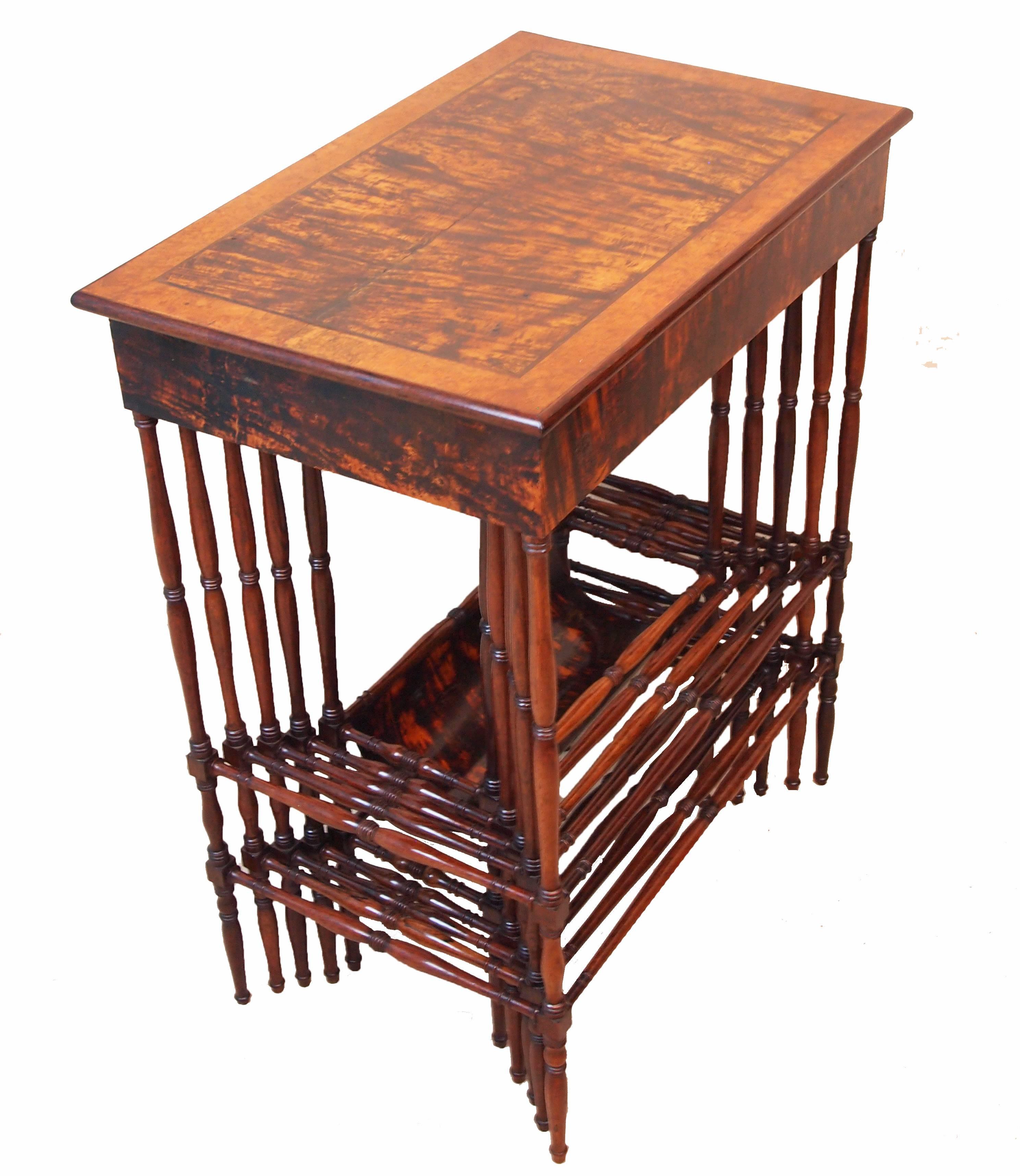An exceptionally fine late Regency period nest of five specimen wood veneered coffee tables, having crossbanded tops incorporating mulberry, satinwood, amboyna. Mahogany, and maple
veneers raised on elegant turned upright supports and stretchers