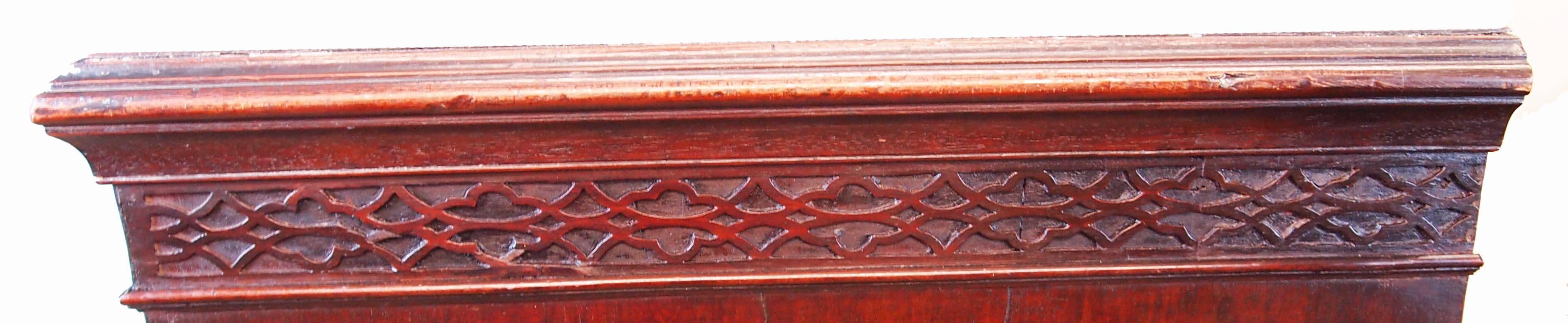 A delightful 18th century Chippendale Period mahogany chest of unusually
Large proportion having well figured top above blind fretwork frieze, two
short and five long drawers retaining original brass handles raised on
original ogee bracket feet.