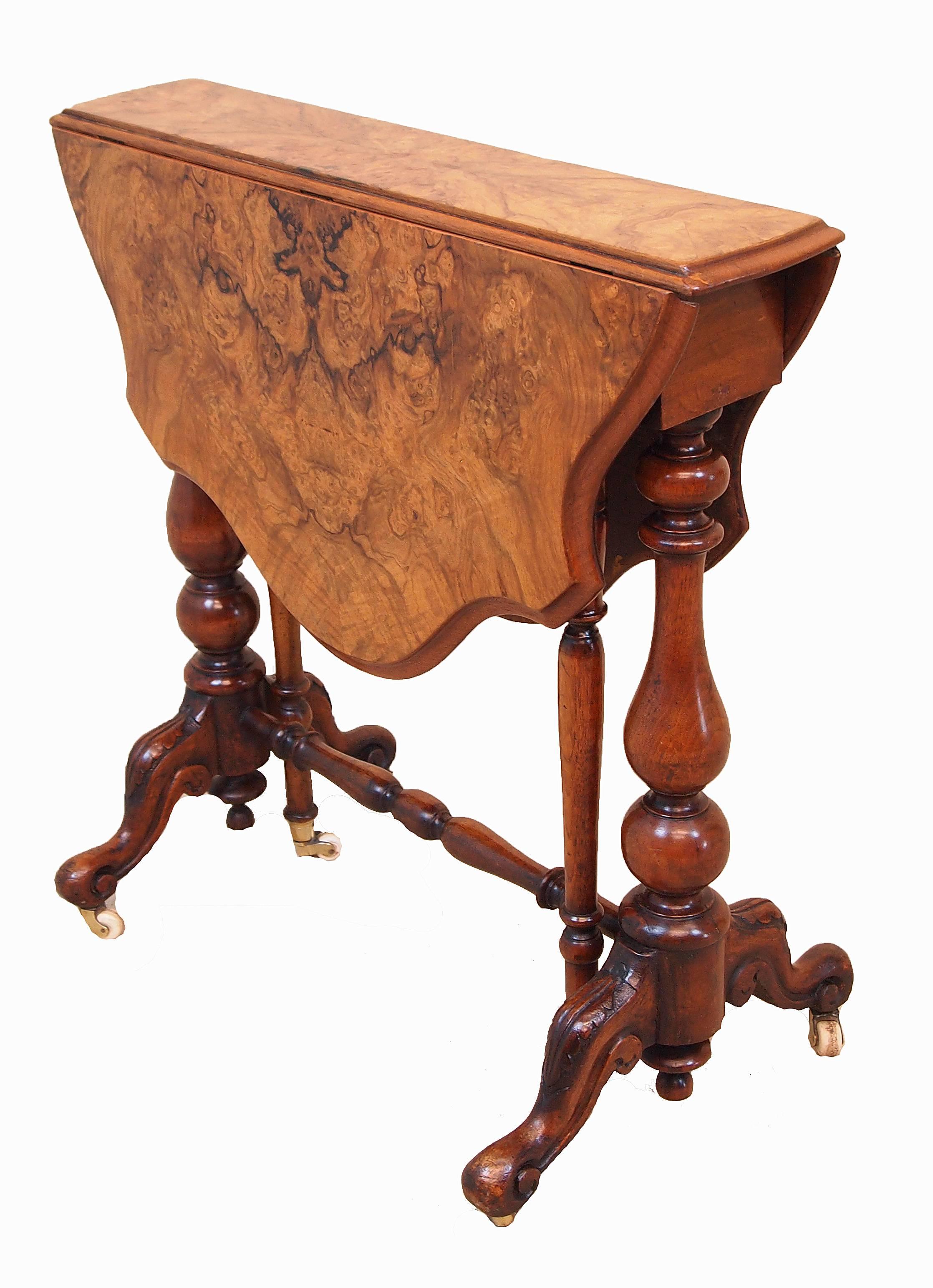 A very good quality 19th century burr walnut baby Sutherland table having exceptionally
well figured shaped top raised on elegant turned supports and carved
cabriole legs

Measures: H 24in
W 5.5in (flaps down)
W 30in (flaps up)
D 25in.