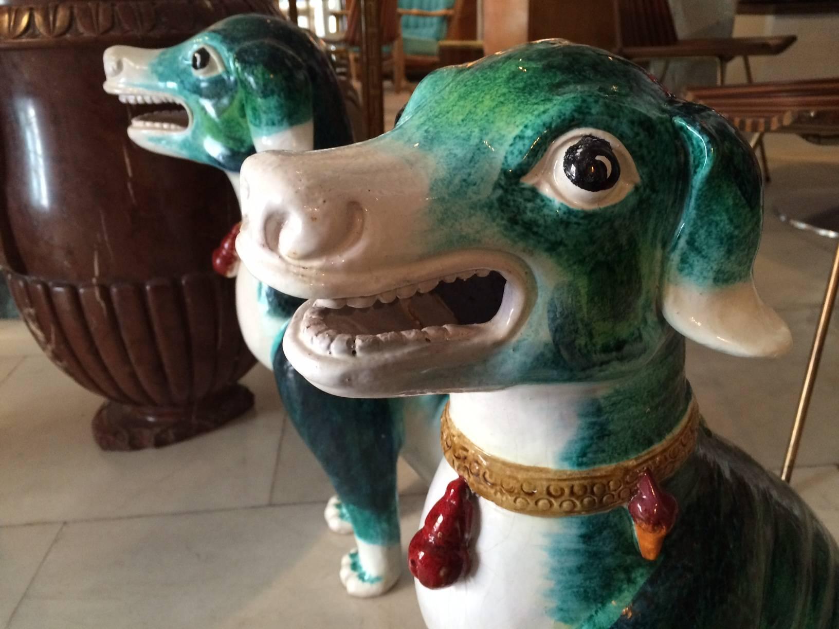 Enameled Pair of ceramic dogs For Sale