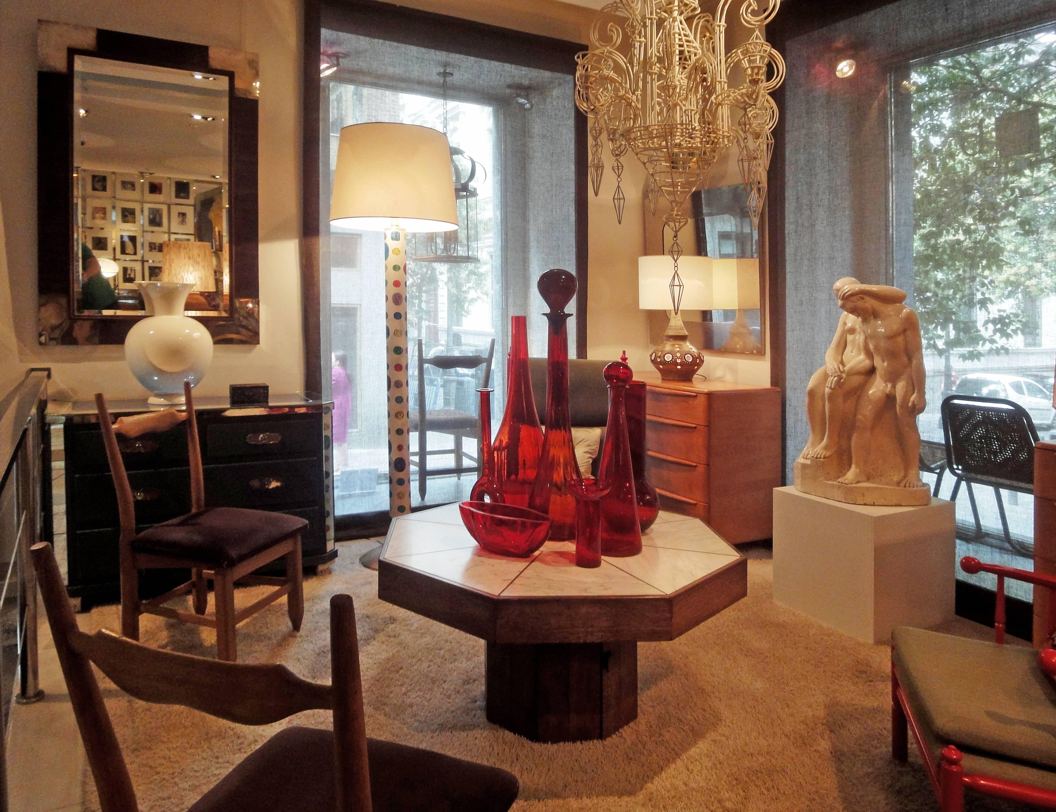 A large floor lamp from the “Cammei” series by Piero Fornasetti.
Polychromed-cameos silk-screen-printed on metal.
 
