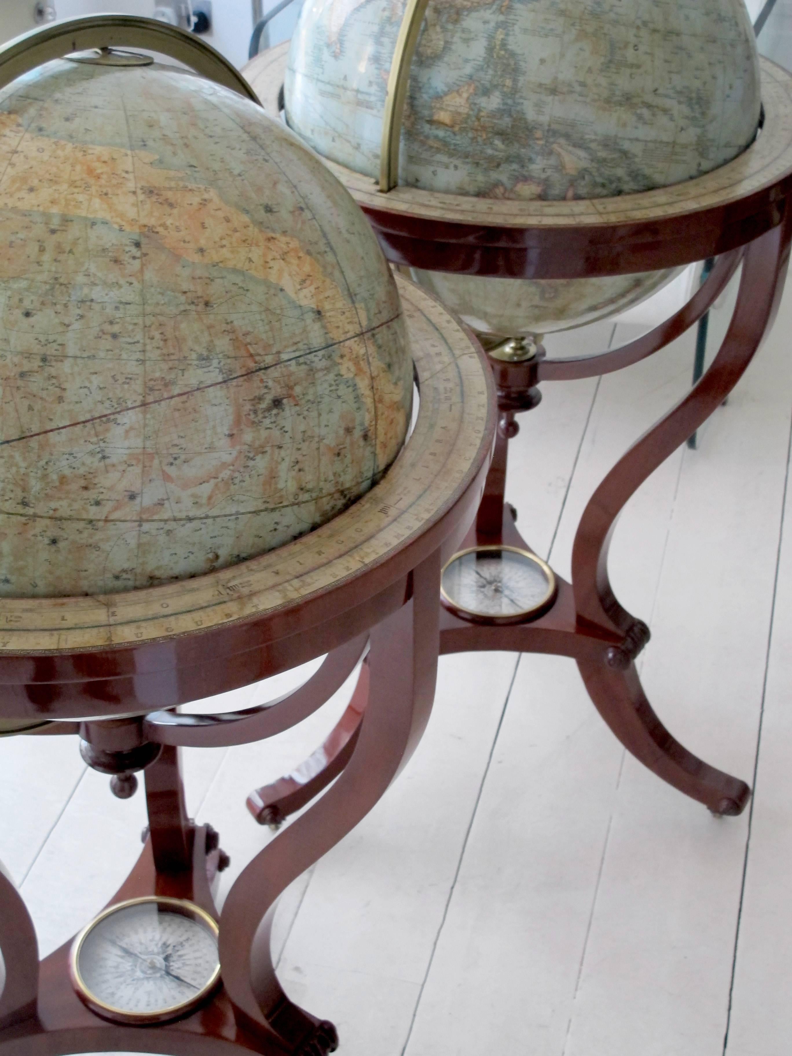 Pair of terrestrial and celestial library globes with compassases
Thomas Malby and Company.
1851 and 1850,
London,
on Mahogany stands, casters.

Height 110 cm.
Diameter 65 cm.