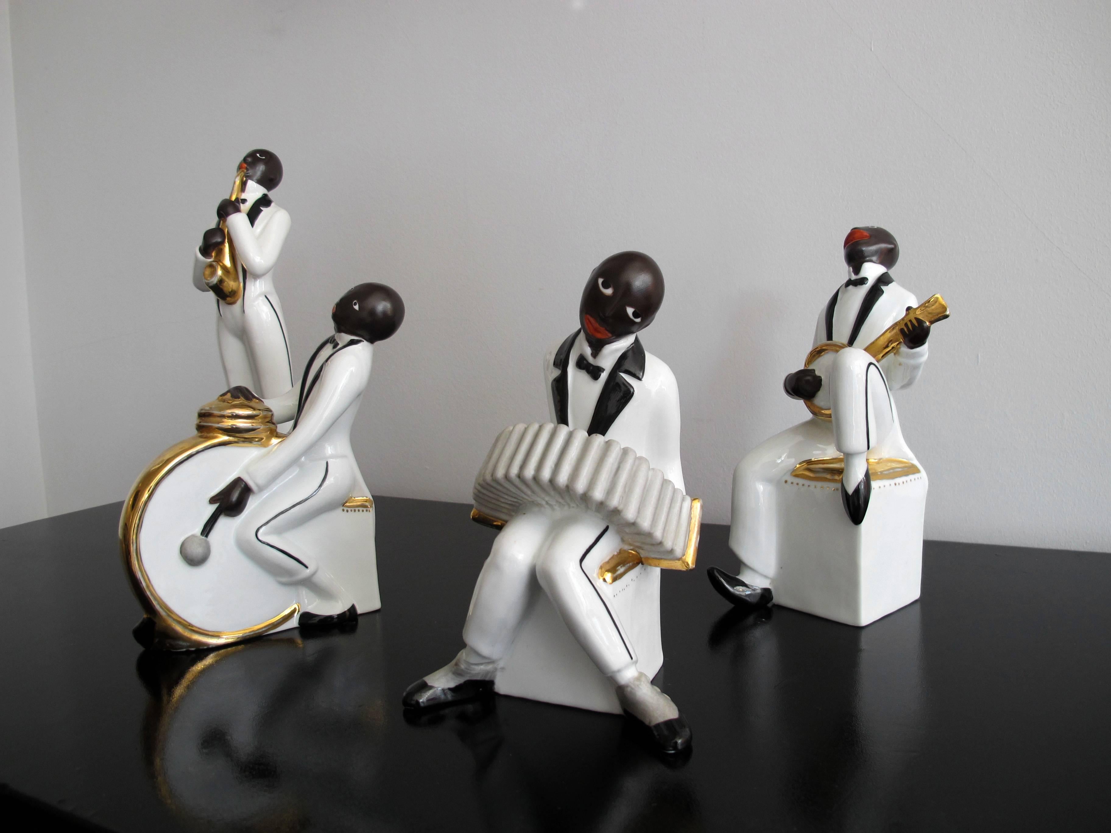Art Deco Jazz band in porcelain.
Designed by ROBJ.
Marked ‘ROBJ Paris, Made in France,
circa 1930,
France.
 