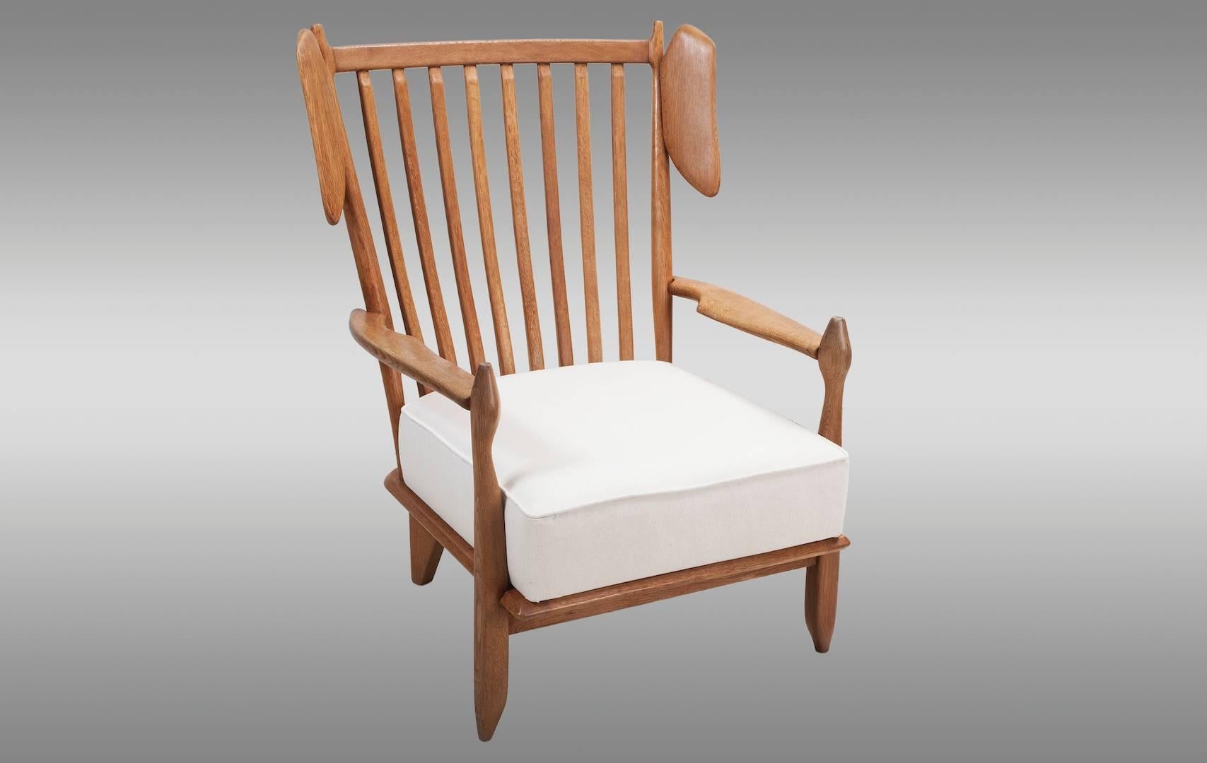 Guillerme et Chambron high back chair in solid oak ''Votre Maison'' edition. New ivory fabric, circa 1960.