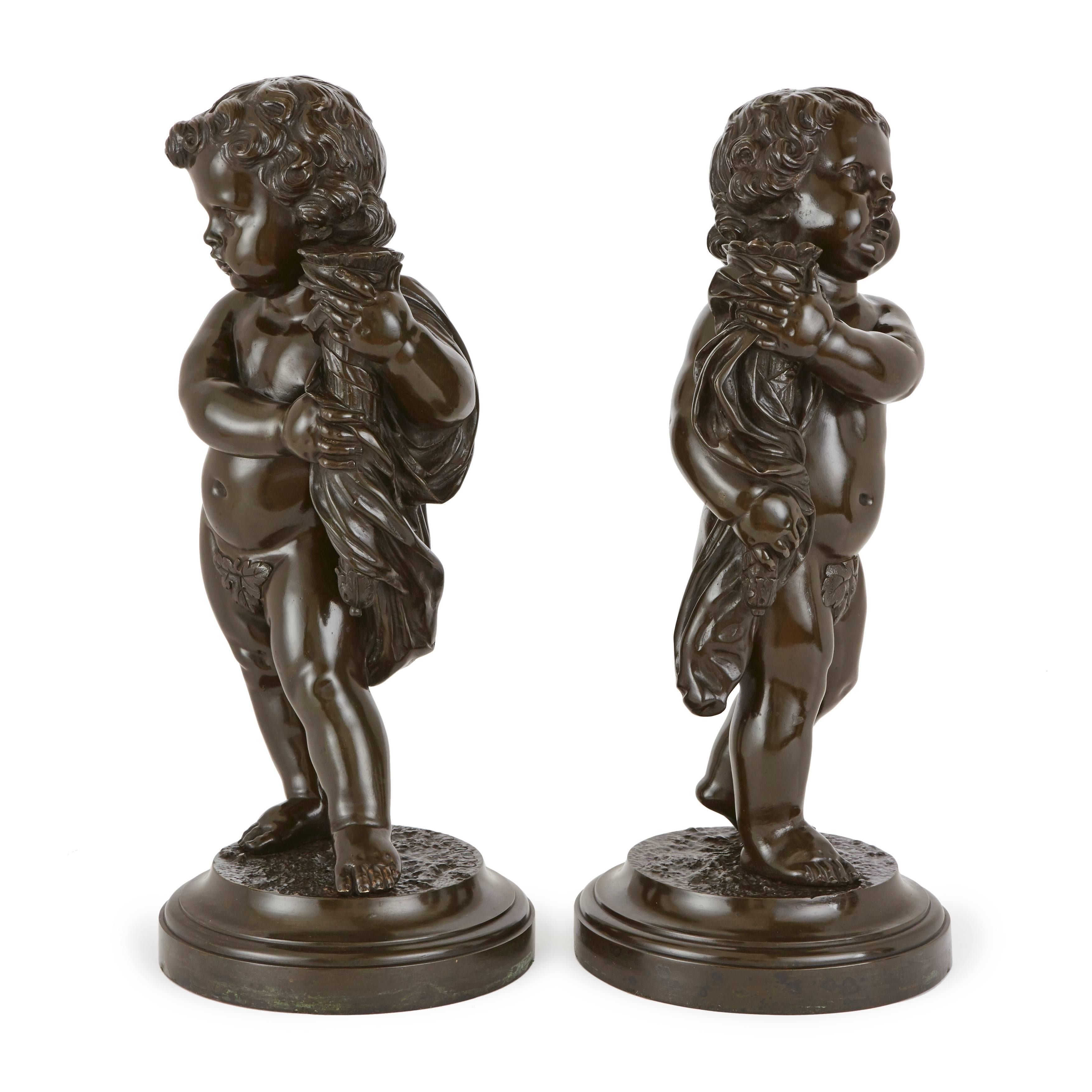 Each shown holding a torchere and standing on a round base, signed to the base 'Clodion'. 

These delicately cast French cherubs are inspired by the tales of Classical mythology, each holding a torchere - traditionally a symbol of love.