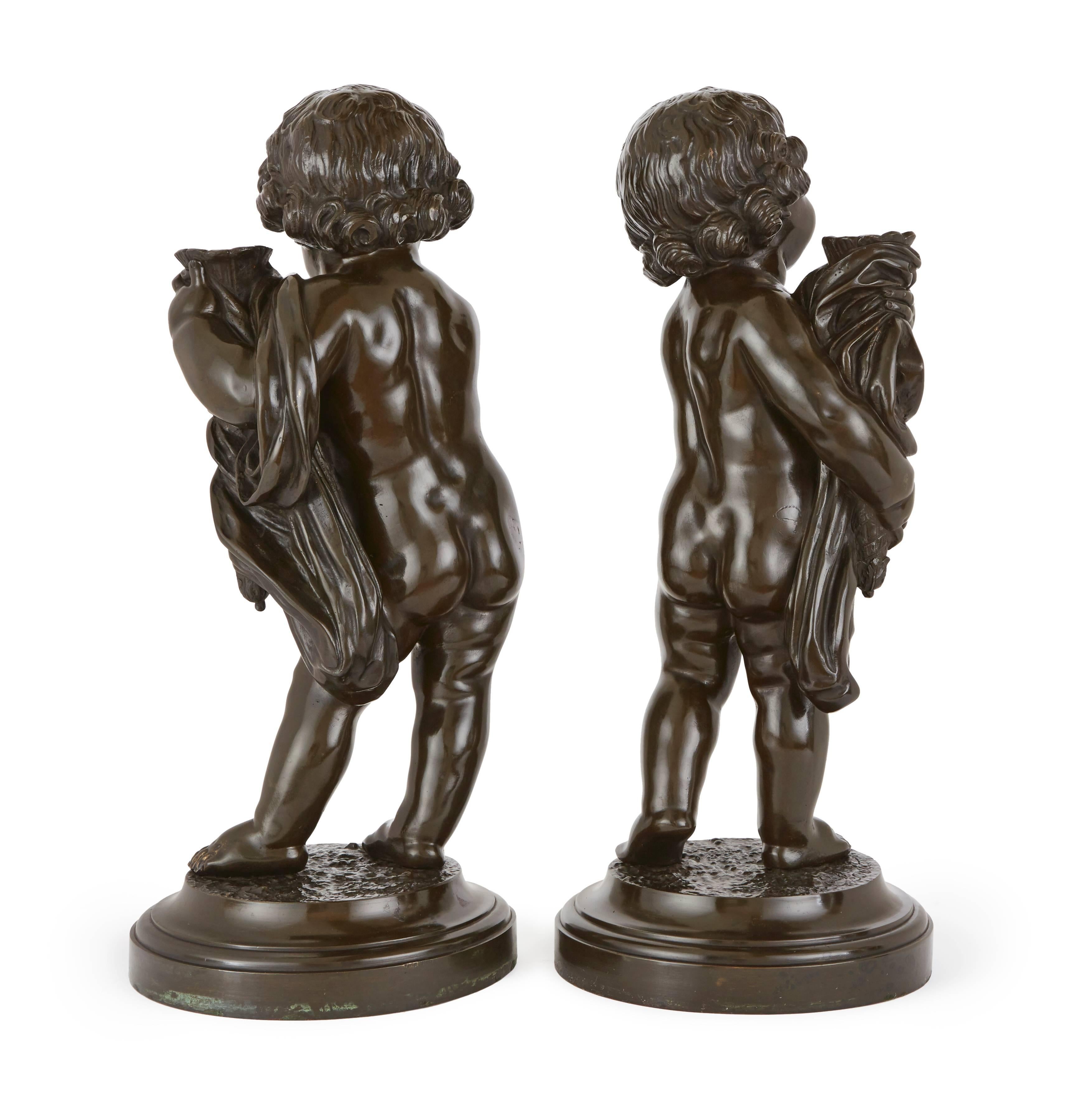 French Pair of Patinated Bronze Antique Cherubs, after Clodion