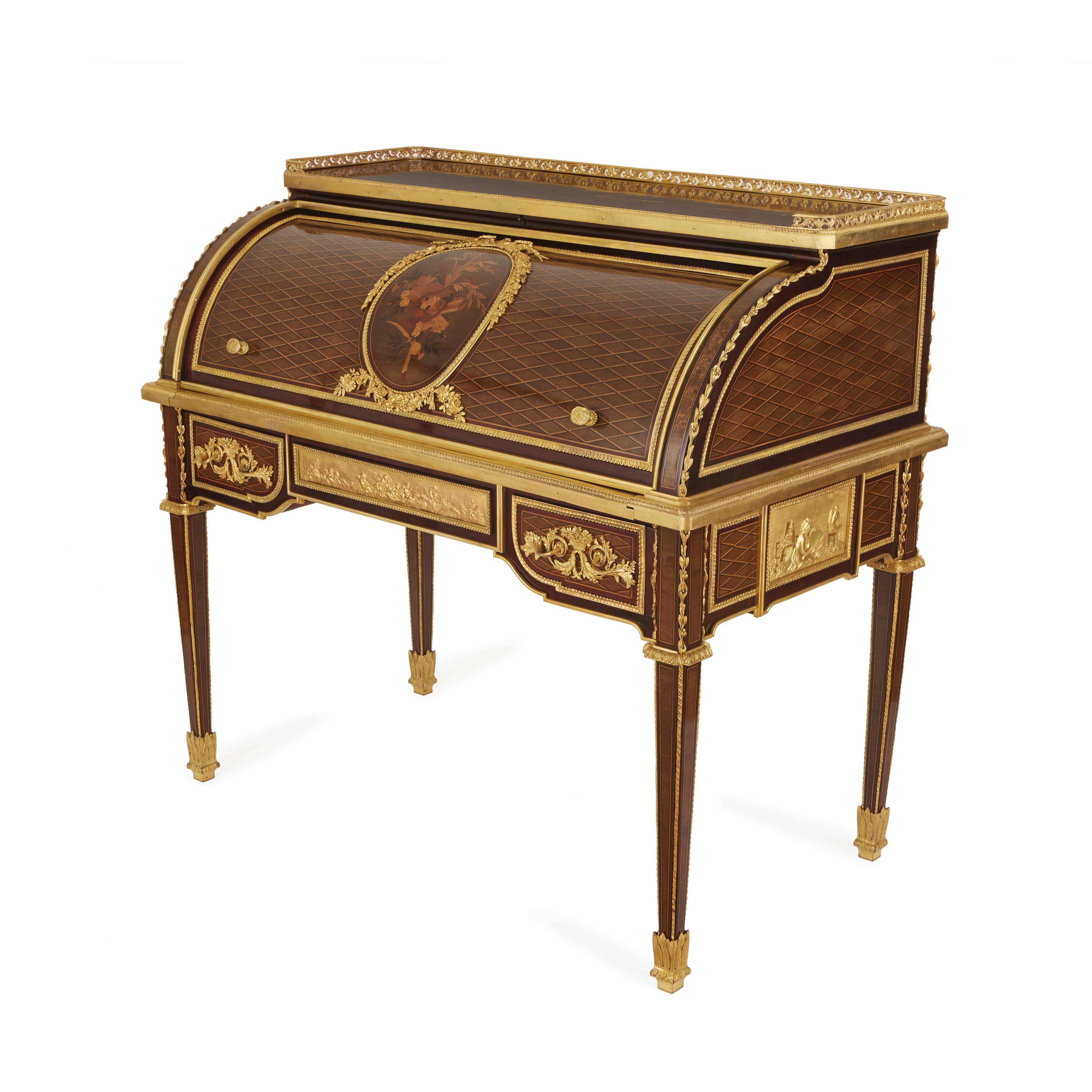 After the model by Jean-Henri Riesener (French, 1734-1806).

Of the Napoleon III period, in the Louis XVI style, with fruitwood and ebony inlaid in bois de citronnier, mahogany and amaranth, with a three-quarter galleried rectangular top above a