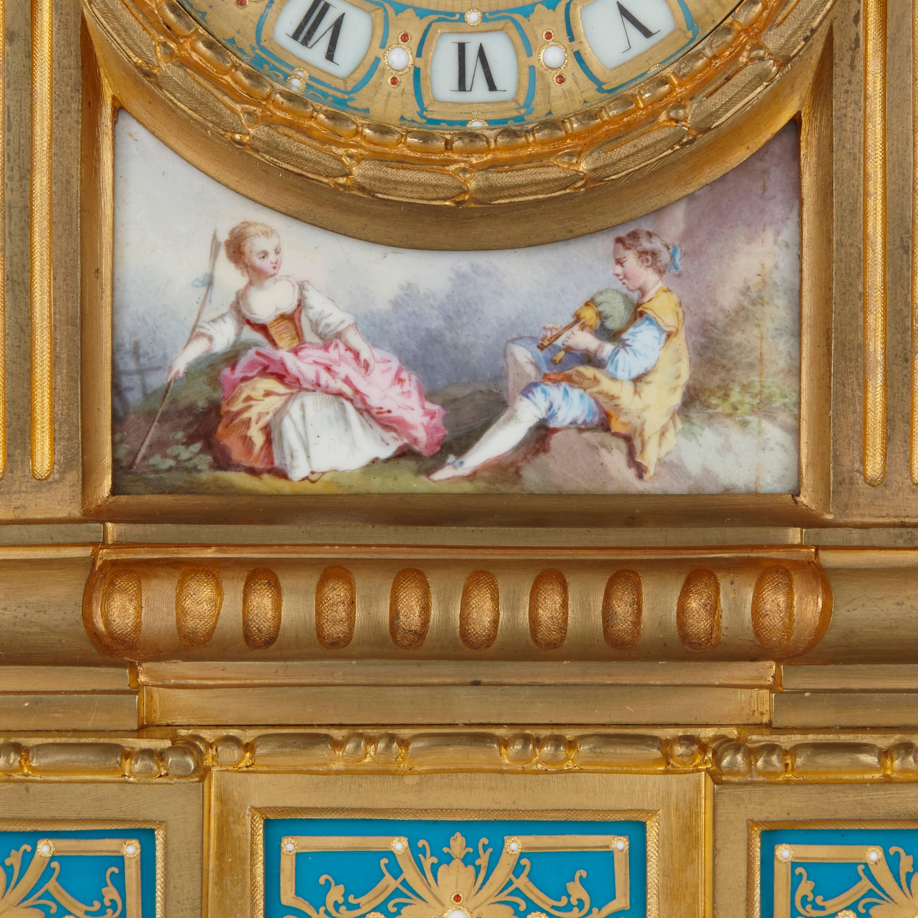 Of porcelain mounted ormolu, the clock's dial marked 'Raingo Fres, Paris', the central clock decorated with a scene of traditional 19th century courtship, the two flanking candelabra depicting cherubs with musical instruments.

Clock