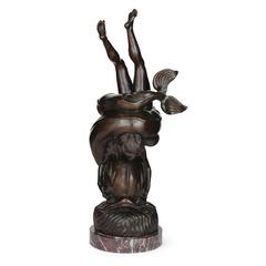 Antique Bronze Figurative Sculpture of Amor with a Dolphin