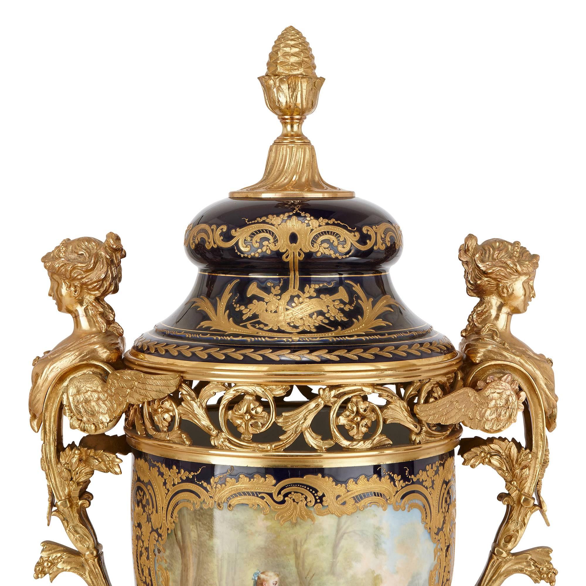 Gilt Three-Piece Antique Sèvres Style Porcelain and Ormolu Garniture