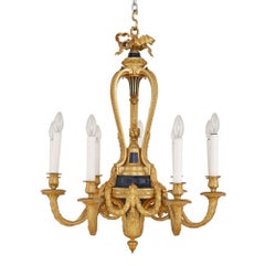 Antique French Belle Époque style gold ormolu and blue detail nine light chandelier