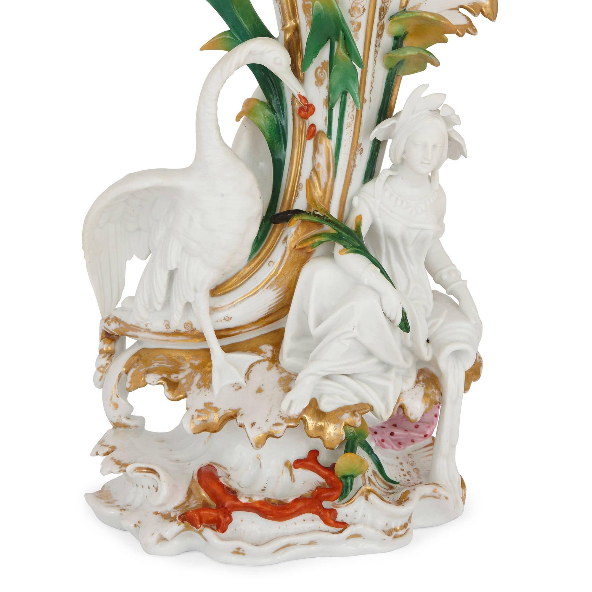Each of trumpet shape with applied allegorical figures of Napoleon III.

These beautiful porcelain vases are distinctive for their bright, fresh color palette and trumpet shaped necks, conjuring images of floral abundance.