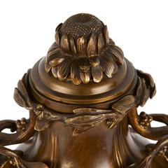 Pair of Gilt and Patinated Bronze Lidded Antique Vases