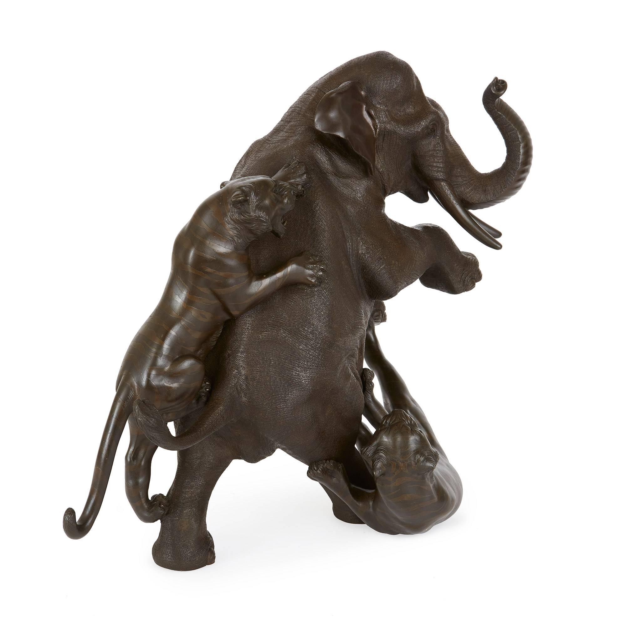 Meiji period, depicting an elephant being attacked by two tigers, with Japanese mark on the base.

Rendered in impressive naturalistic detail, this charming model dates to the Japanese Meiji period, a time famous for its high quality craftsmanship.