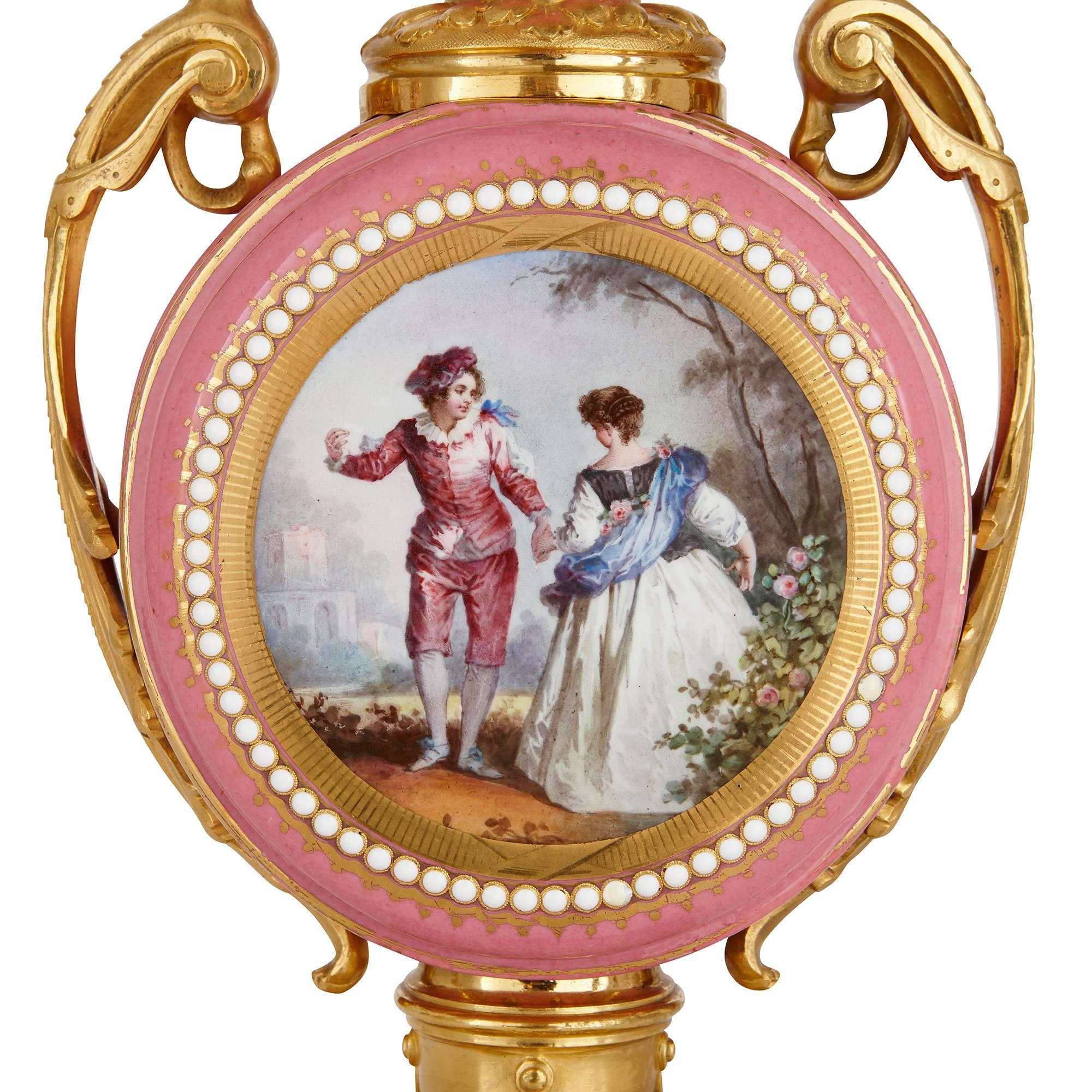 Bronze Sèvres Style Gold Ormolu and Pink Porcelain Antique French Three-Piece Clock Set For Sale