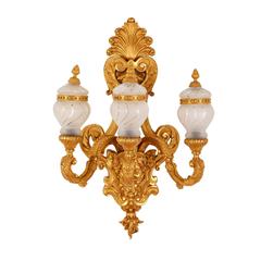 Set of Four French Gilt Bronze ‘Ormolu’Mounted Glass Three-Light Wall Lights