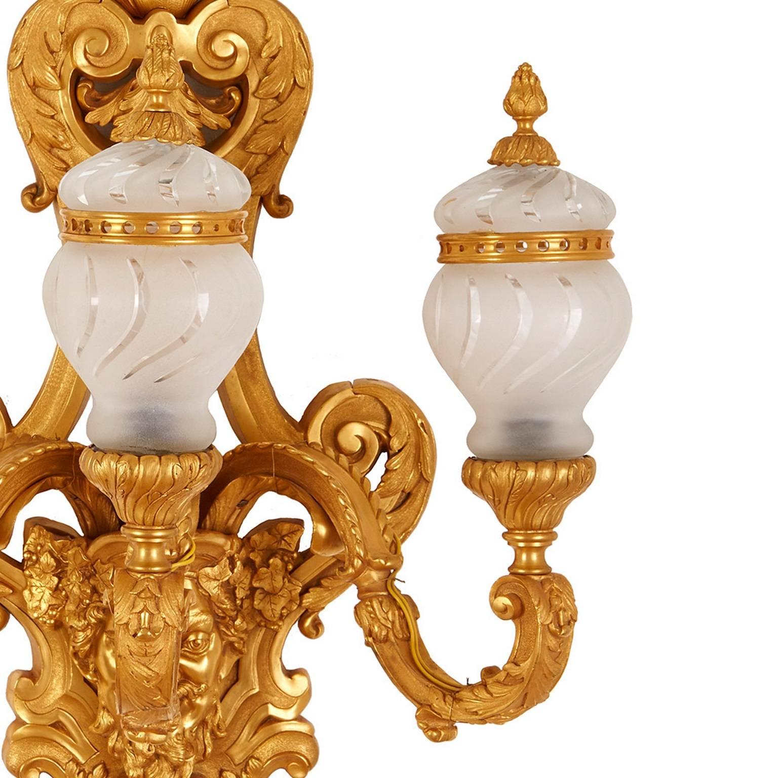 Frosted Set of Four French Gilt Bronze ‘Ormolu’Mounted Glass Three-Light Wall Lights For Sale