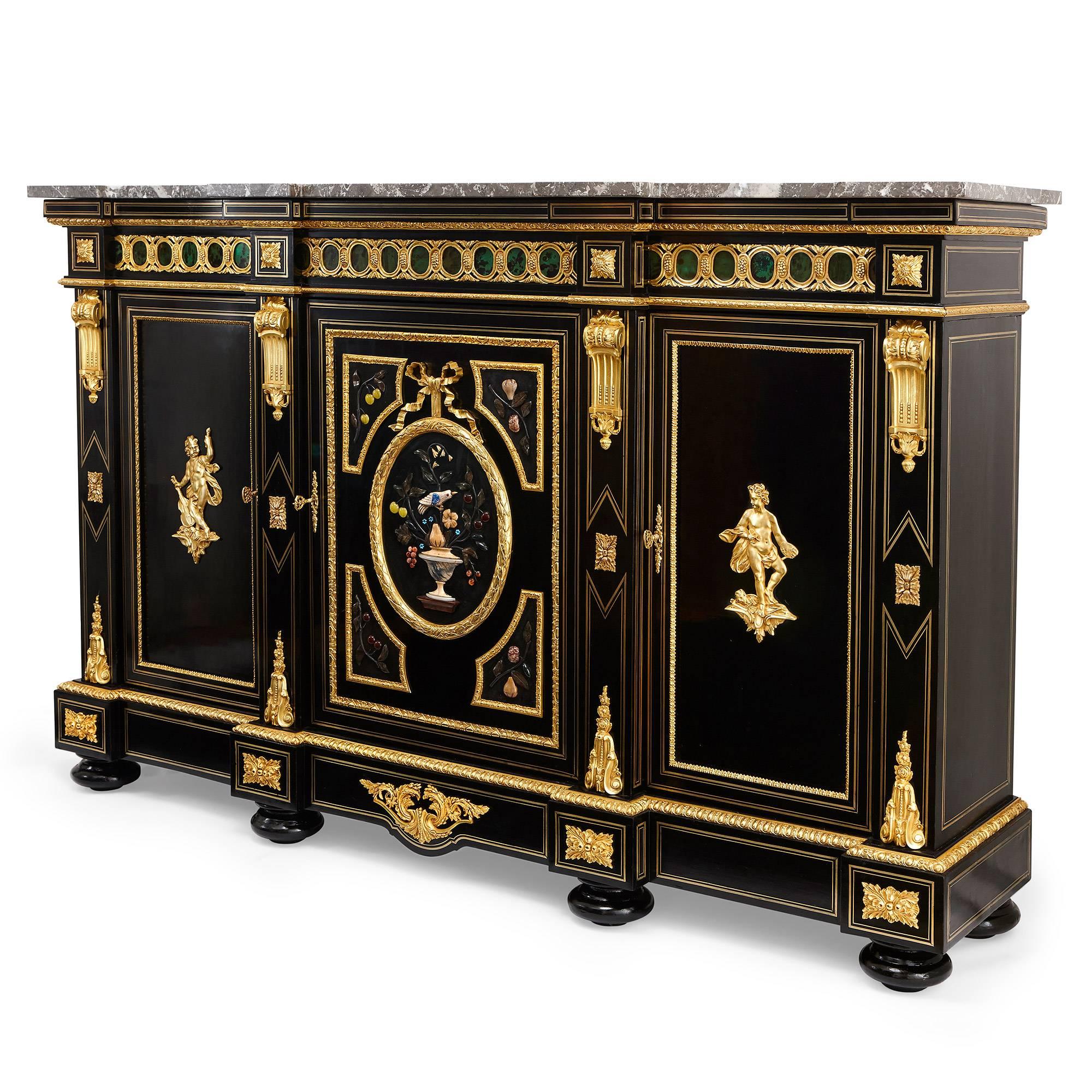 This exceptional ebonized wood antique cabinet is a brilliant example of the high quality furniture produced during the Napoleon III period. Featuring a marble top with outset corners and an gilt bronze (ormolu) cast banding over a green colored