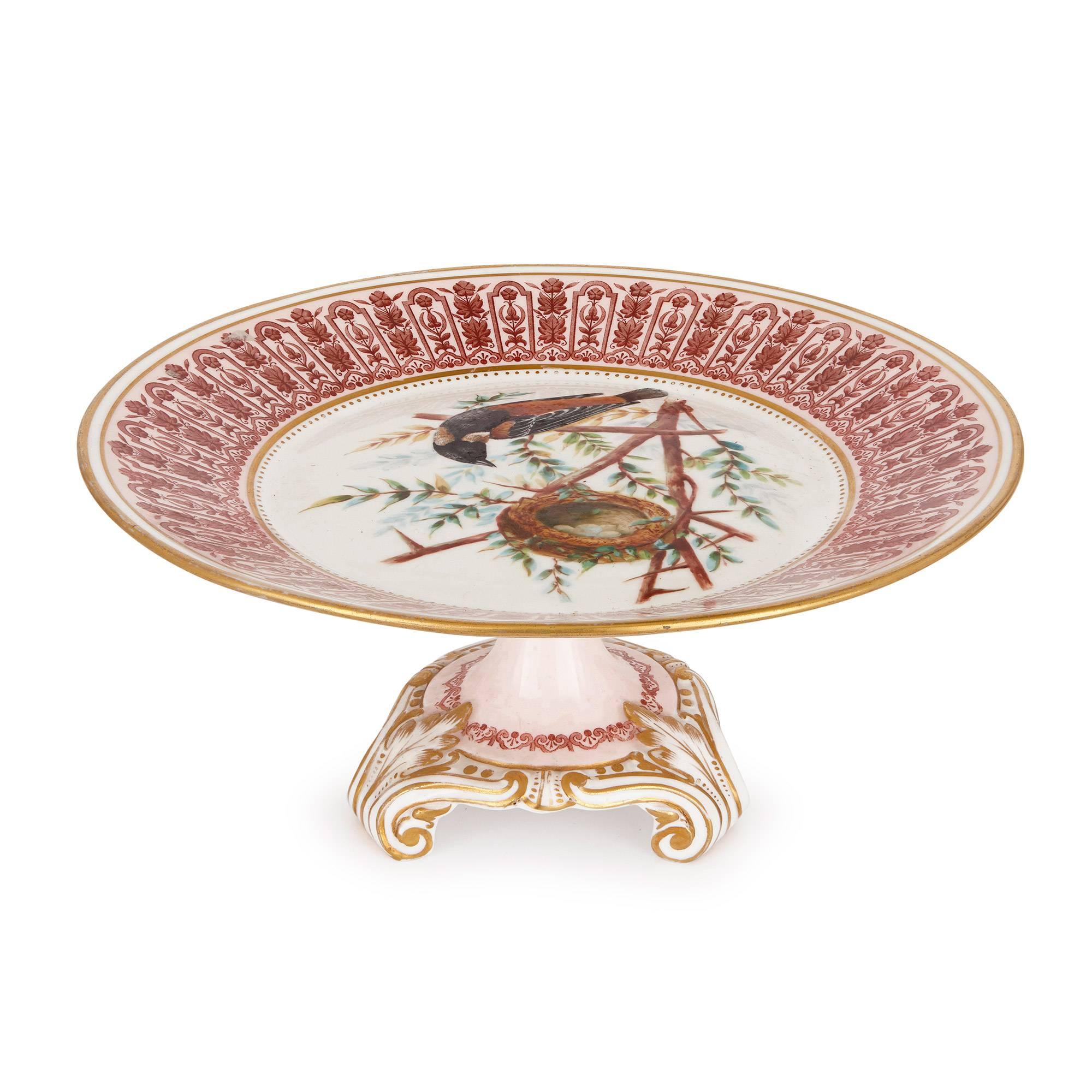 This splendid antique dessert service is impressive both for its beautiful design and its prestigious maker, Royal Crown Derby Porcelain, which was appointed the official royal porcelain manufacturer to Queen Victoria of England in 1890.