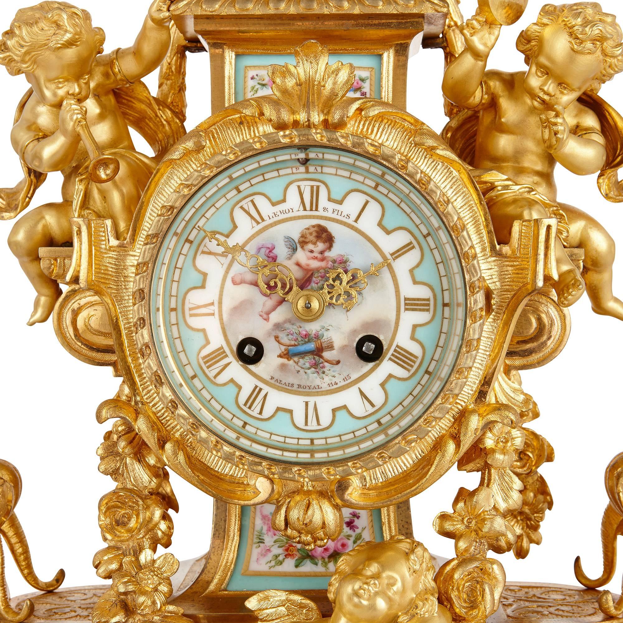 Neoclassical Antique French Gilt Bronze and Sèvres Style Porcelain Three-Piece Clock Set