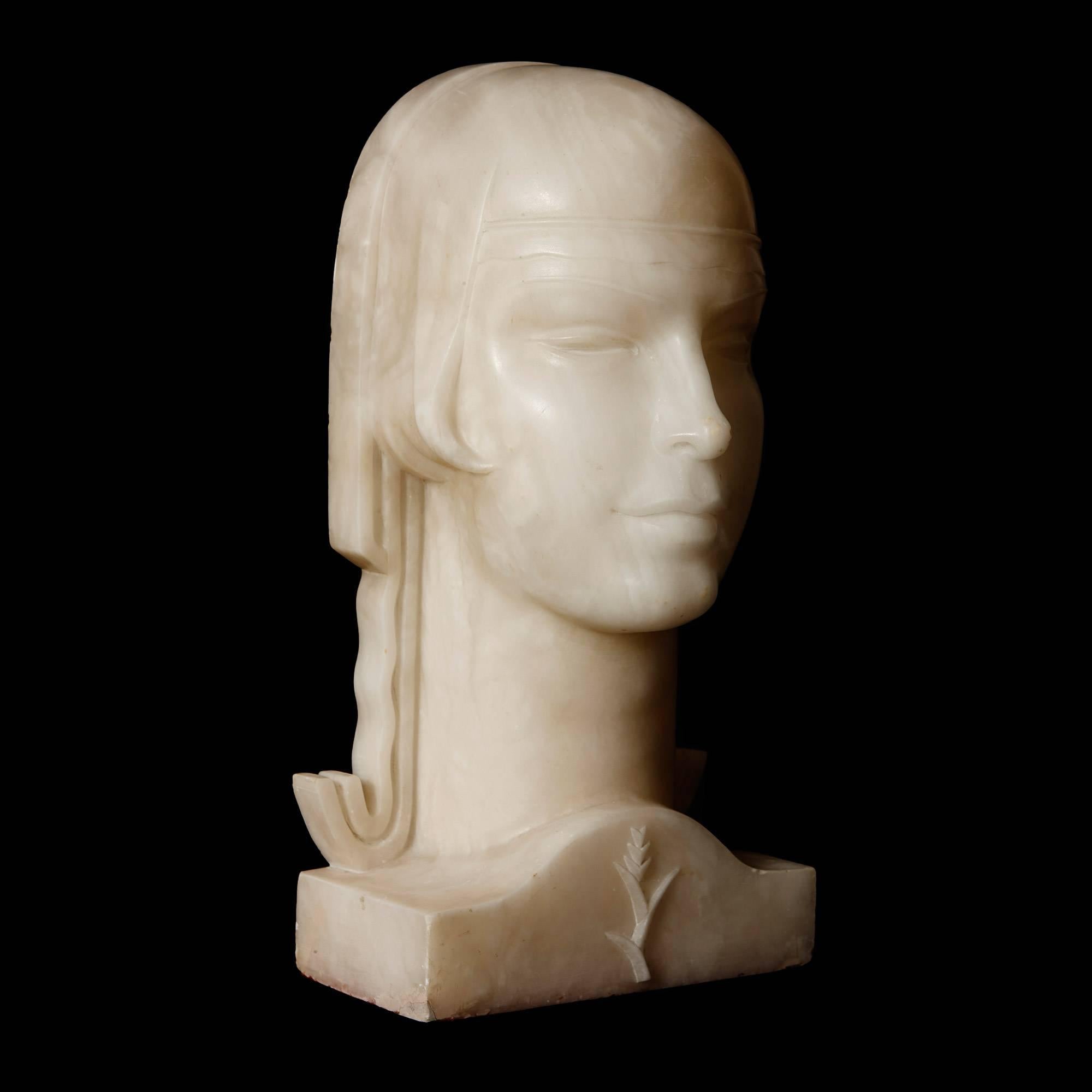This impressive alabaster bust has been beautifully carved to represent an elegant lady's head and shoulders, set on a rectangular plinth. With harmonious proportions and straight lines, the sculpture is an excellent example of the refined Art Deco