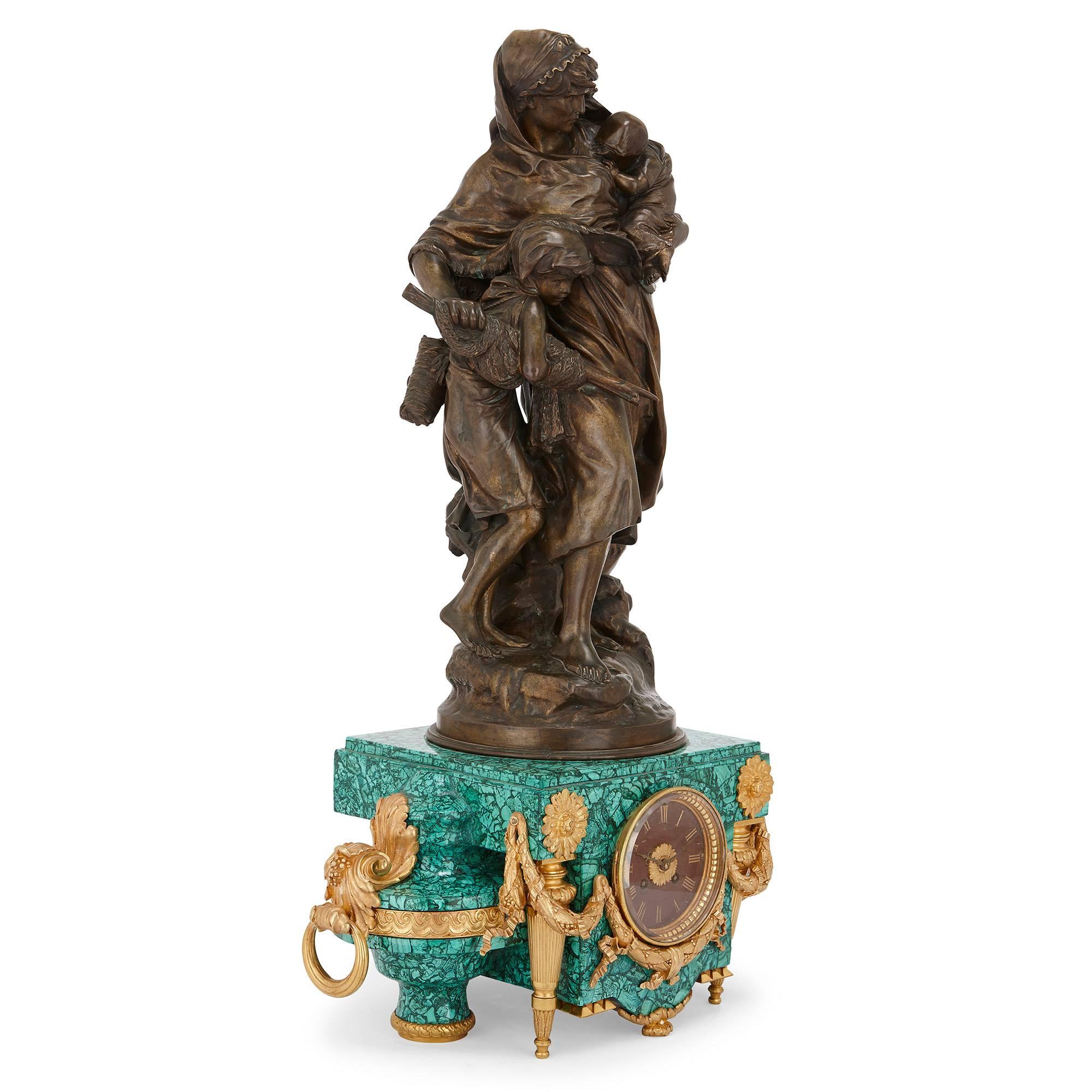 This beautiful antique mantel clock is set on a malachite base with ormolu mounts, and is notable for its patinated bronze group, which is by Mathurin Moreau and entitled 'The Fisherman's Wife'.

Height of patinated bronze 60cm
Height of clock