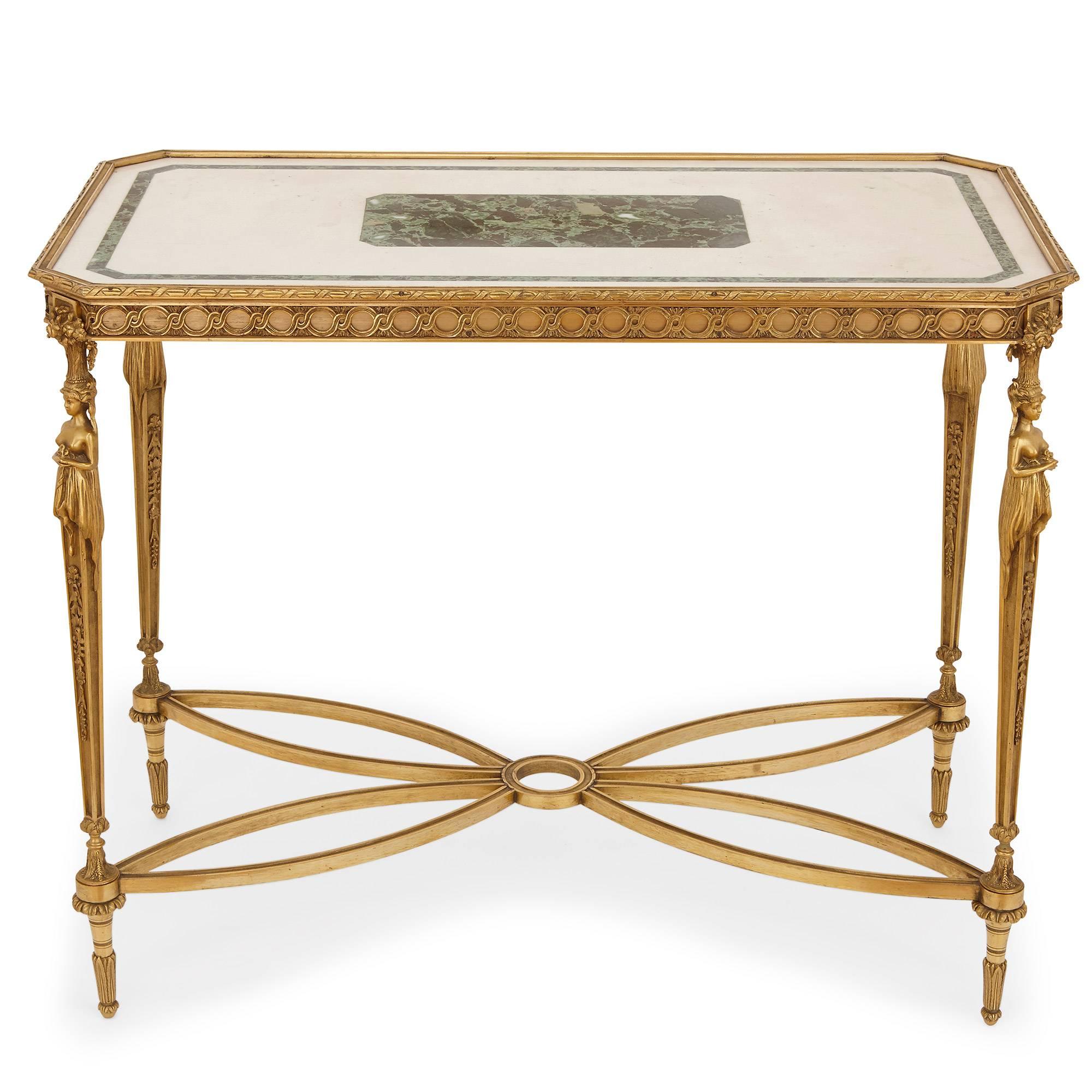 Created in the beautifully elegant Neoclassical style, these fine centre tables are in the manner of prestigious French furniture maker Adam Weisweiler (circa 1750-1810), who was a preeminent French master cabinet maker (ébéniste) in the Louis XVI
