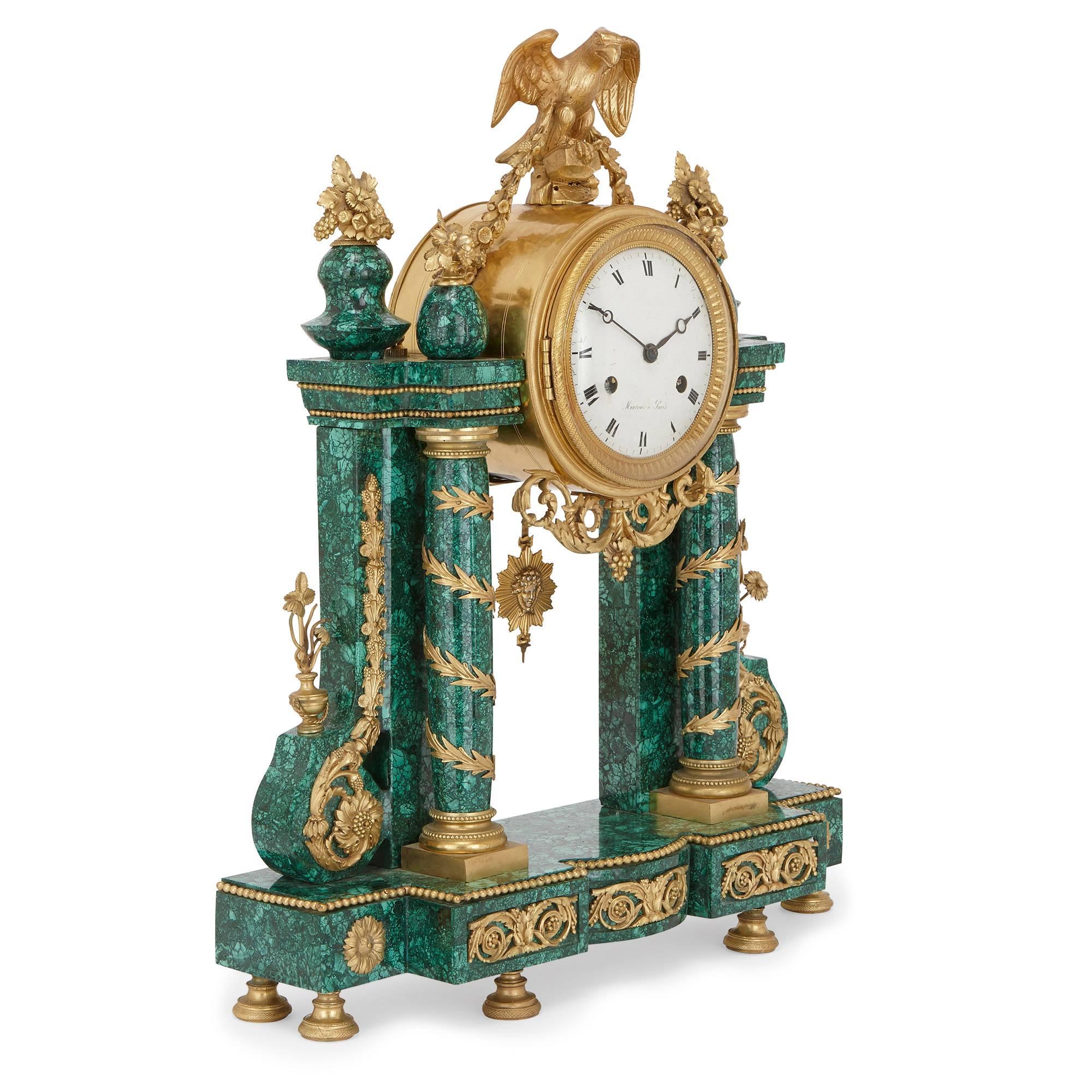 This exquisite antique mantel clock was originally retailed by the French firm Monroux, based in Paris. The work dates to the Louis XVI period, and is modelled in the refined neoclassical style. The clock's the central circular enamel dial is