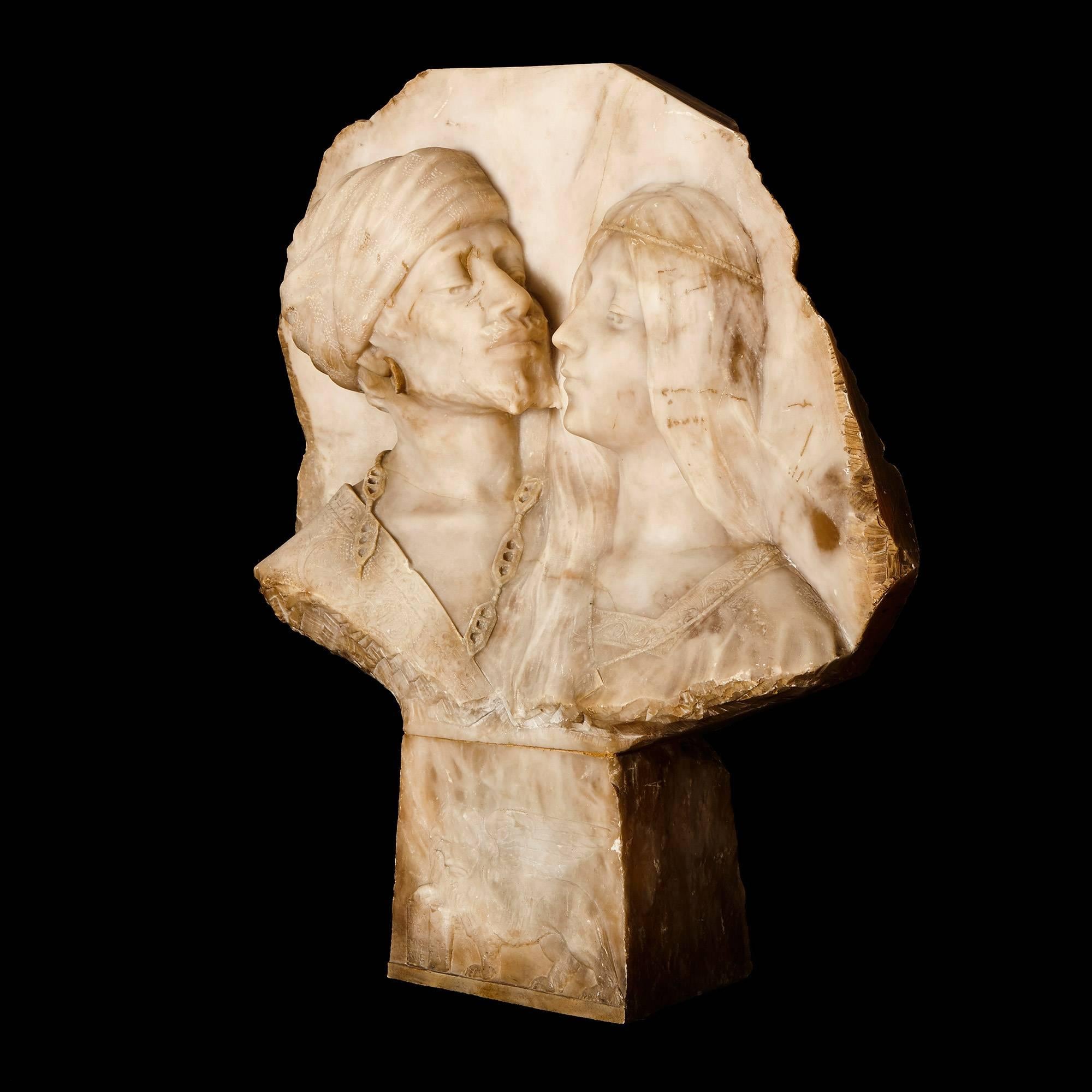 This charming antique panel is carved in the refined Orientalist style, and depicts a tender embrace between man and woman, capturing a moment of emotional intensity.

The panel portrays an Arabic male and female in typical dress facing towards