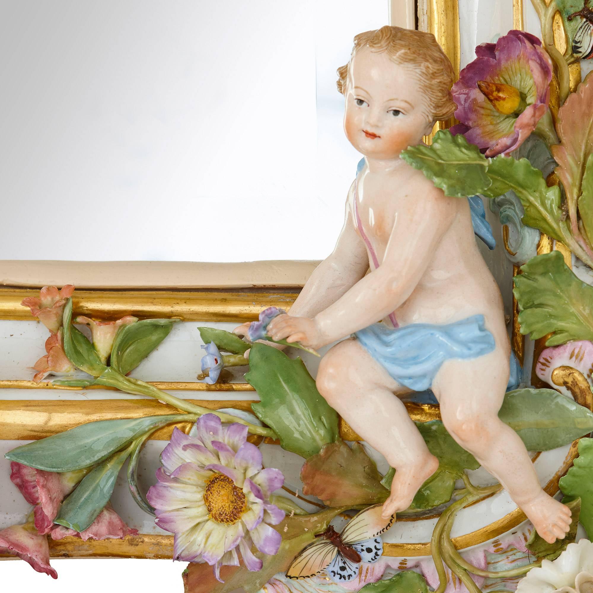 This awe-inspiring mirror features an exceptional frame crafted in Meissen porcelain and exceptionally decorated with colorful flowers, birds, butterflies, insects, putti, leaves and foliage. Every tiny detail, down to the last petal, has been