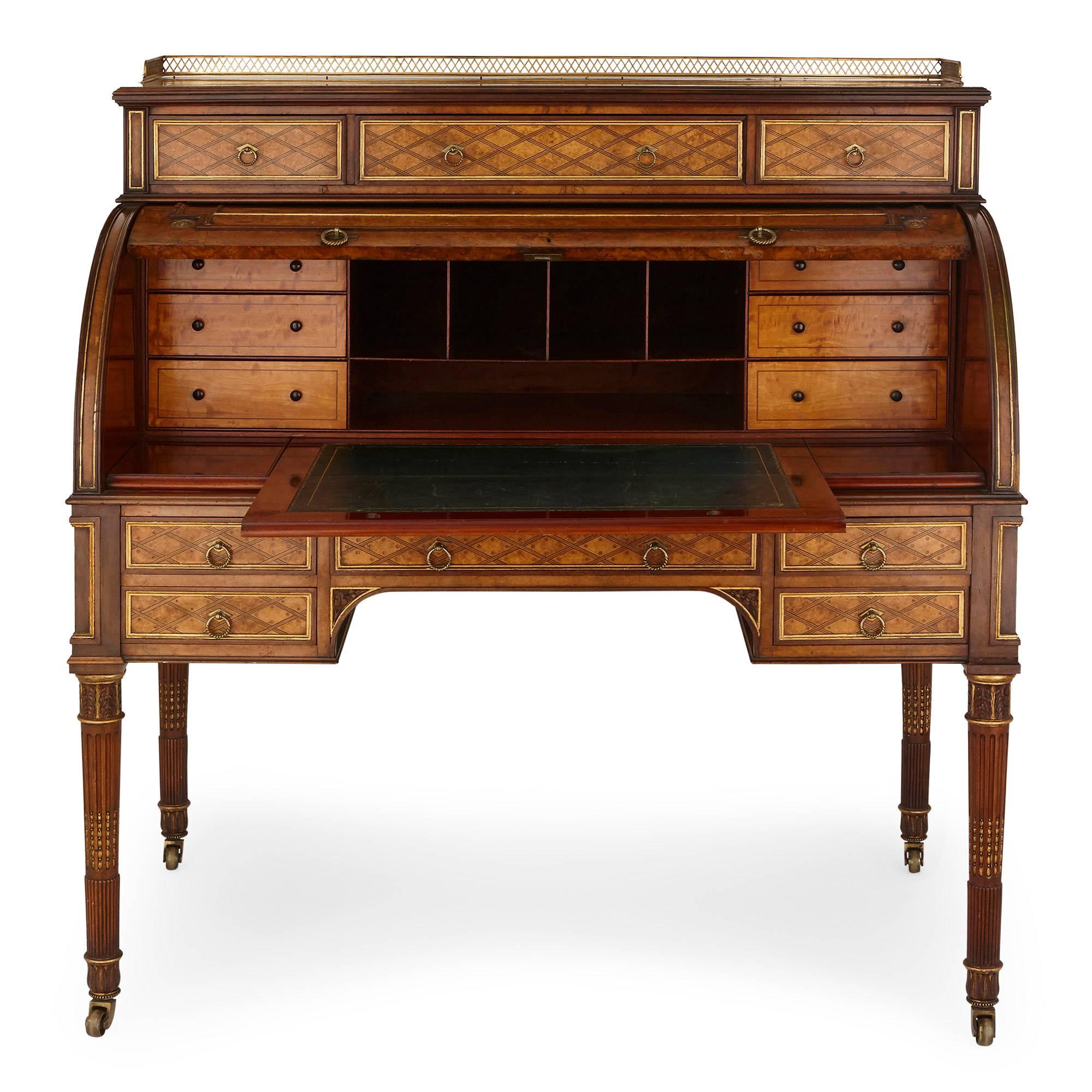 The classic, distinctive diamond shaped parquetry design of perhaps the most acclaimed British furniture maker of the 19th century, Donald Ross, adorns this fine bureau. Below its four tapering, fluted legs, the table has wheels on, which it allow