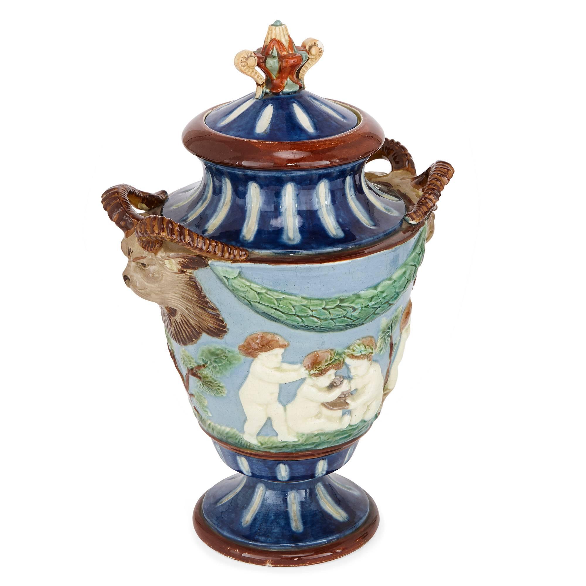 English Pair of antique vases with putti