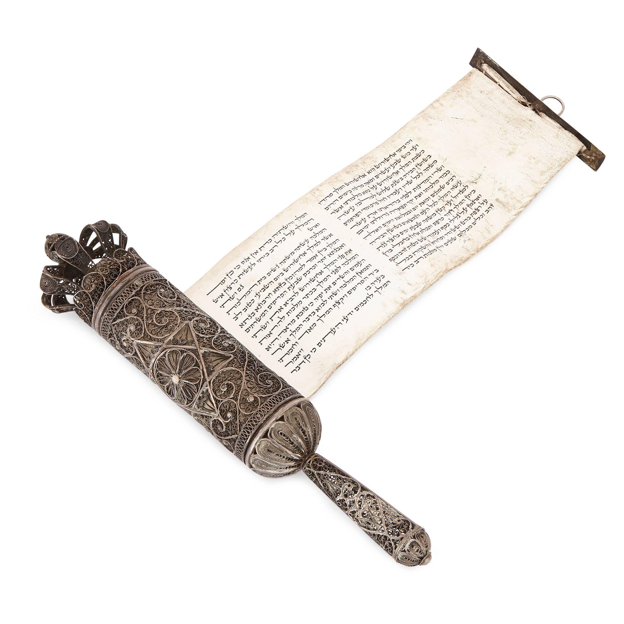 The fine and intricate Megillah case showcases some of the finest work of the Bezalel Academy of Arts and Design, the most celebrated artistic school in Jerusalem of the early 20th Century. Founded in 1906, the aim of its founder, painter Boris