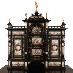 Grand Bonheur du Jour en bois ébène et émail viennois monté en ormolu