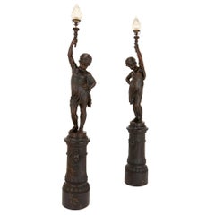 Pair of Cast Iron Figural Torcheres by A. Durenne