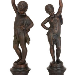 Pair of Cast Iron Figural Torcheres by A. Durenne