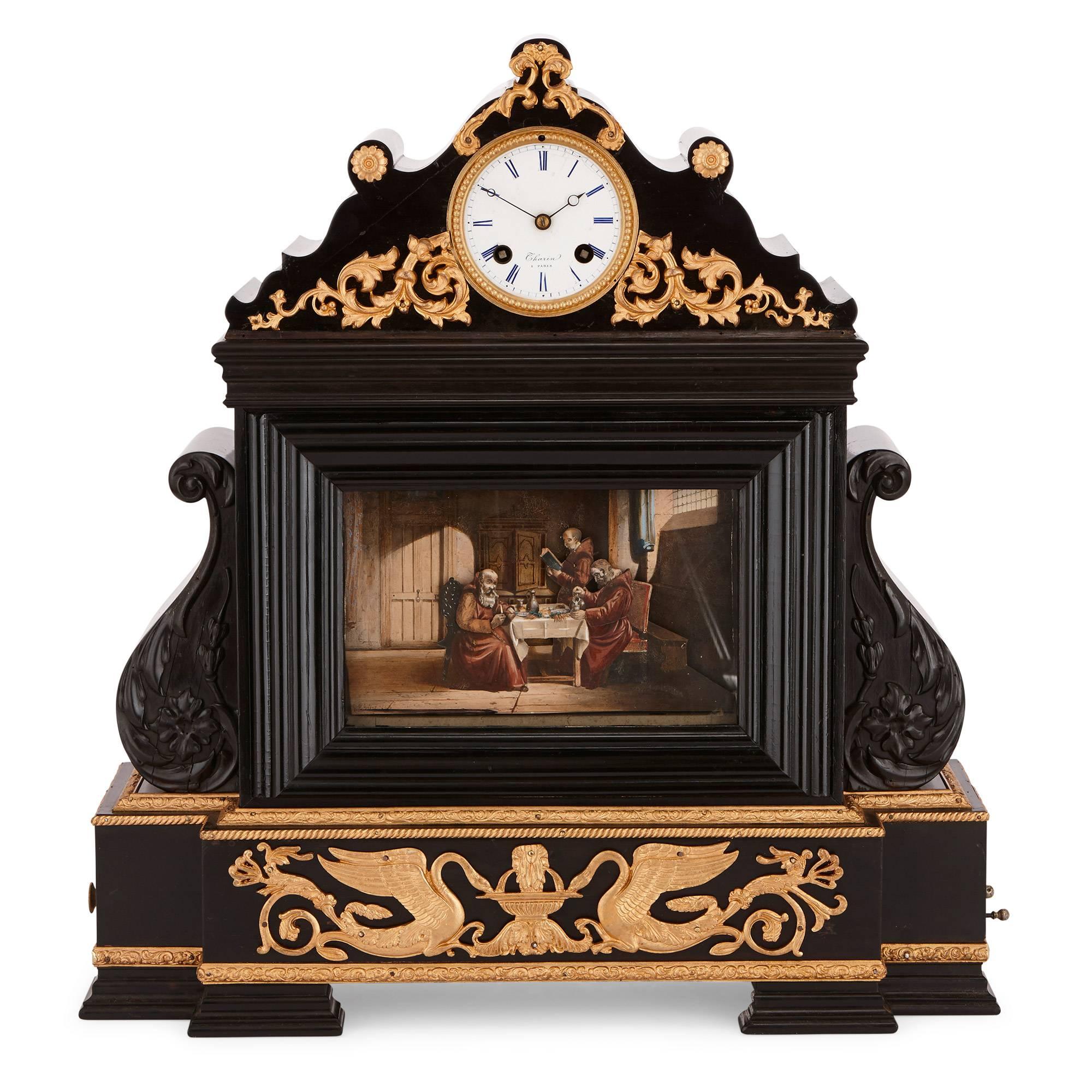 This fine, antique mantel clock is constructed in ebonised wood by the renowned Parisian maker of automata, Xavier Tharin (French, active mid 19th Century). The clock face is set onto a curled, stylized pediment atop the clock case. The face is of