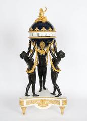 Marble Mounted Gilt and Patinated Bronze Three-Piece Clock Set by H. Dasson