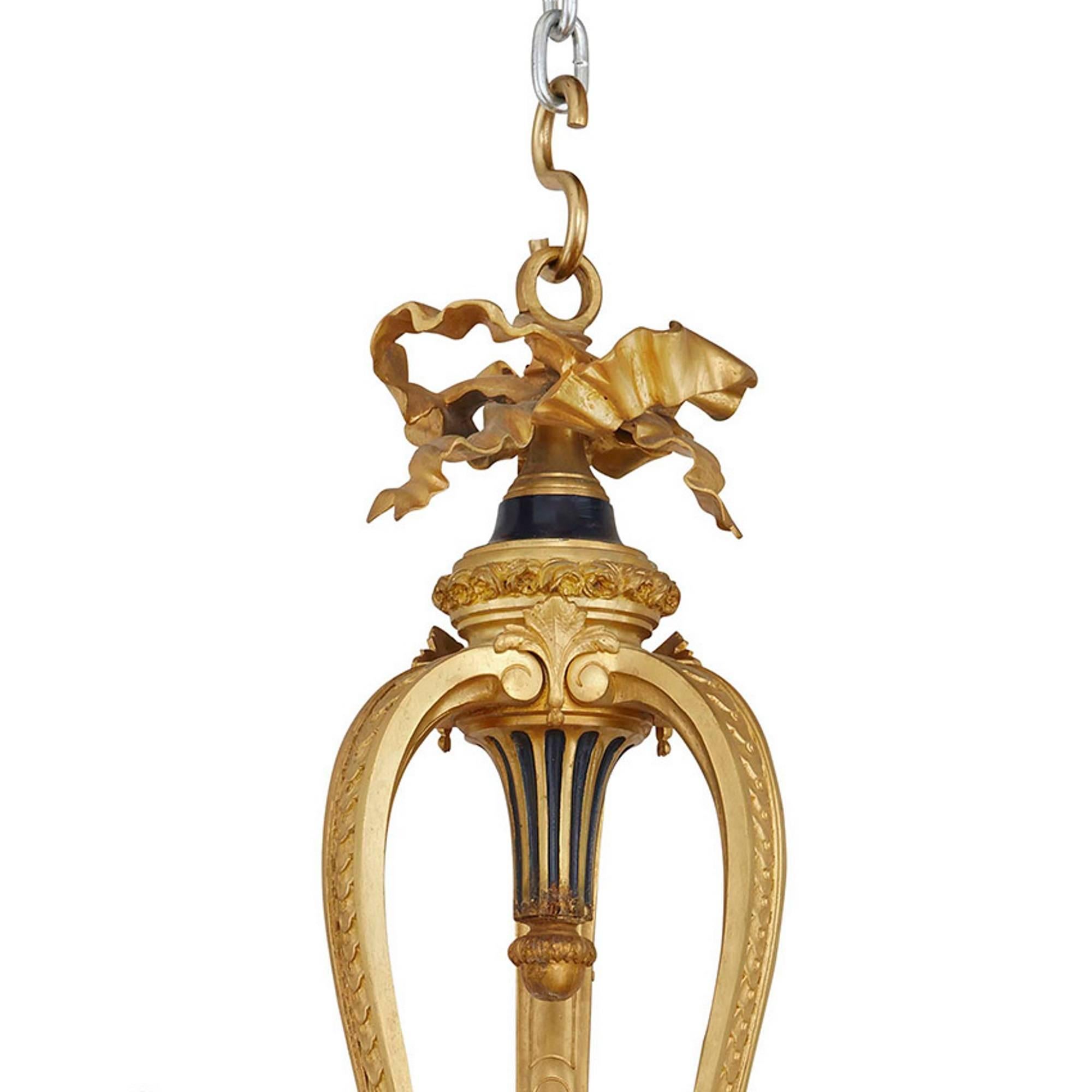 Bronze French Belle Époque style gold ormolu and blue detail nine light chandelier For Sale