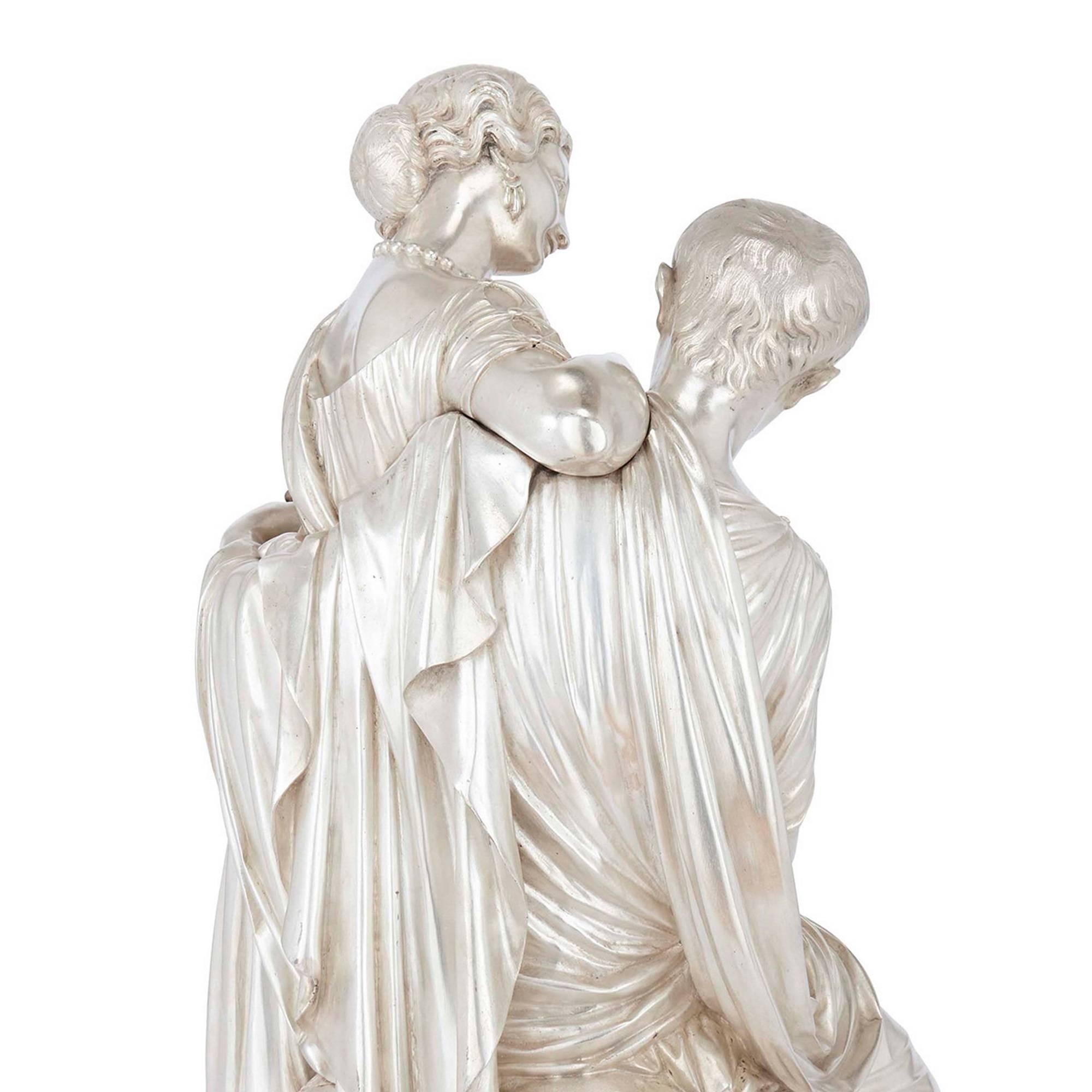 Doré Sculpture française ancienne d'un couple en bronze argenté et doré par Devaulx en vente