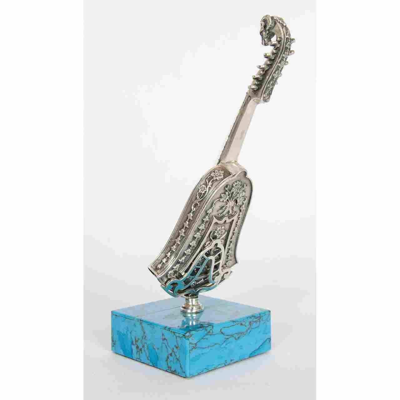 This fine antique set of musical instruments are crafted in miniature from luxurious materials including turquoise and silver. The set was made in the late 19th century in Vienna, which was highly celebrated for its music. 
The set comprises four