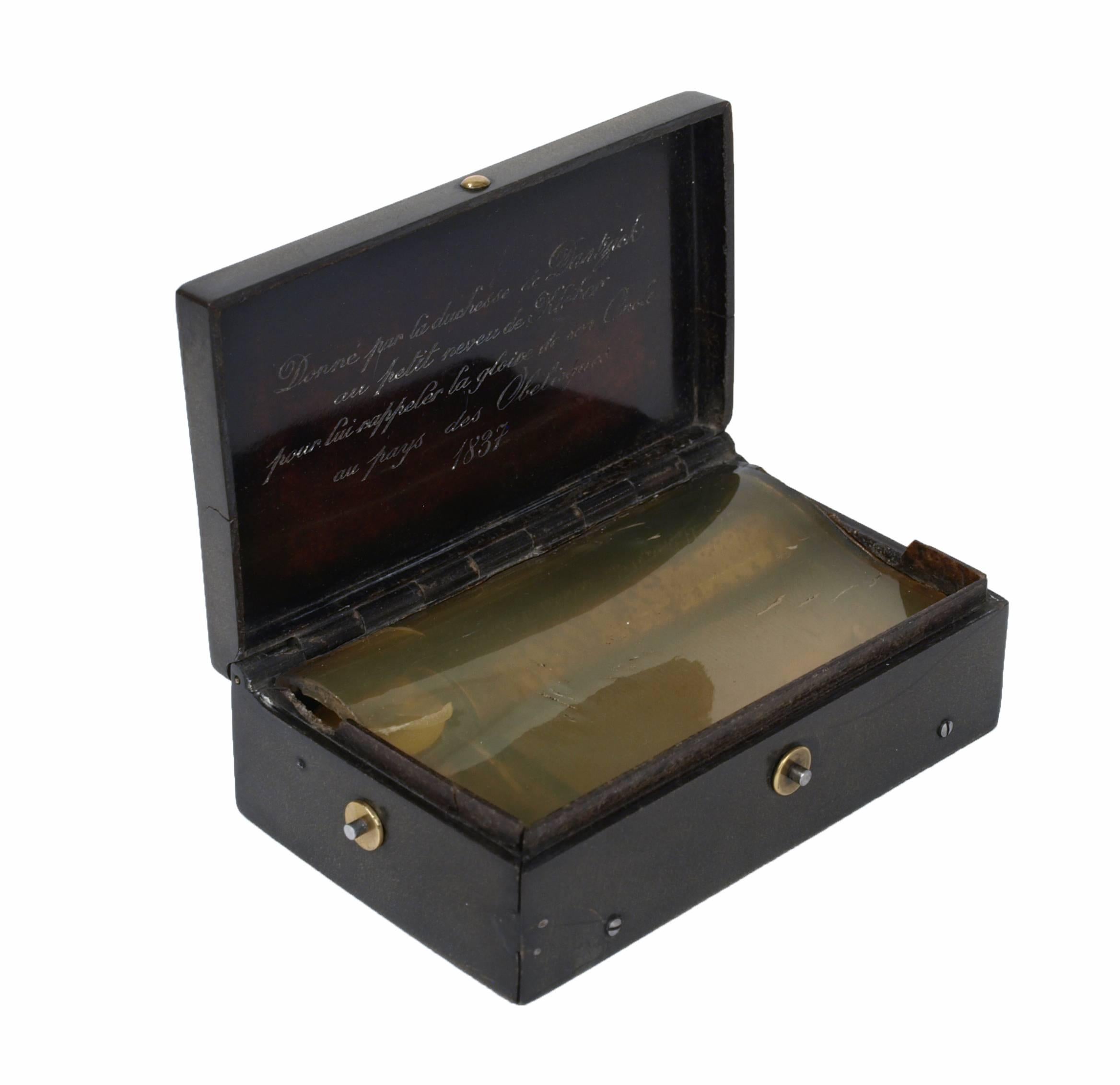 This finely engraved and inscribed tortoiseshell music box is a precious piece of French Revolution and Napoleonic history: given as a gift by the Duchess of Gdansk in 1837 to a nephew of the famous revolutionary general Kleber, the box features an