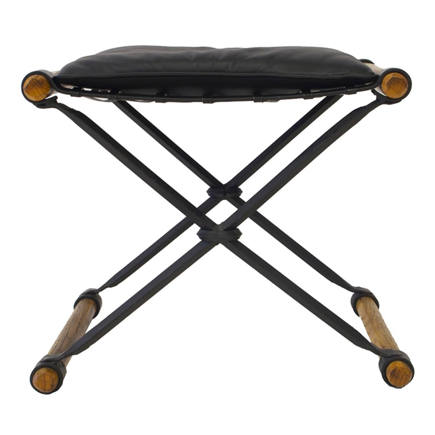 Cleo Baldon X-Benches Leather Oak Wrought Iron Pair, USA, 1960s.  New leather cushions. Black wrought iron frame with oak dowels. Baldon was one of the leading architects and designers who led the California Design movement in the 1960s. She