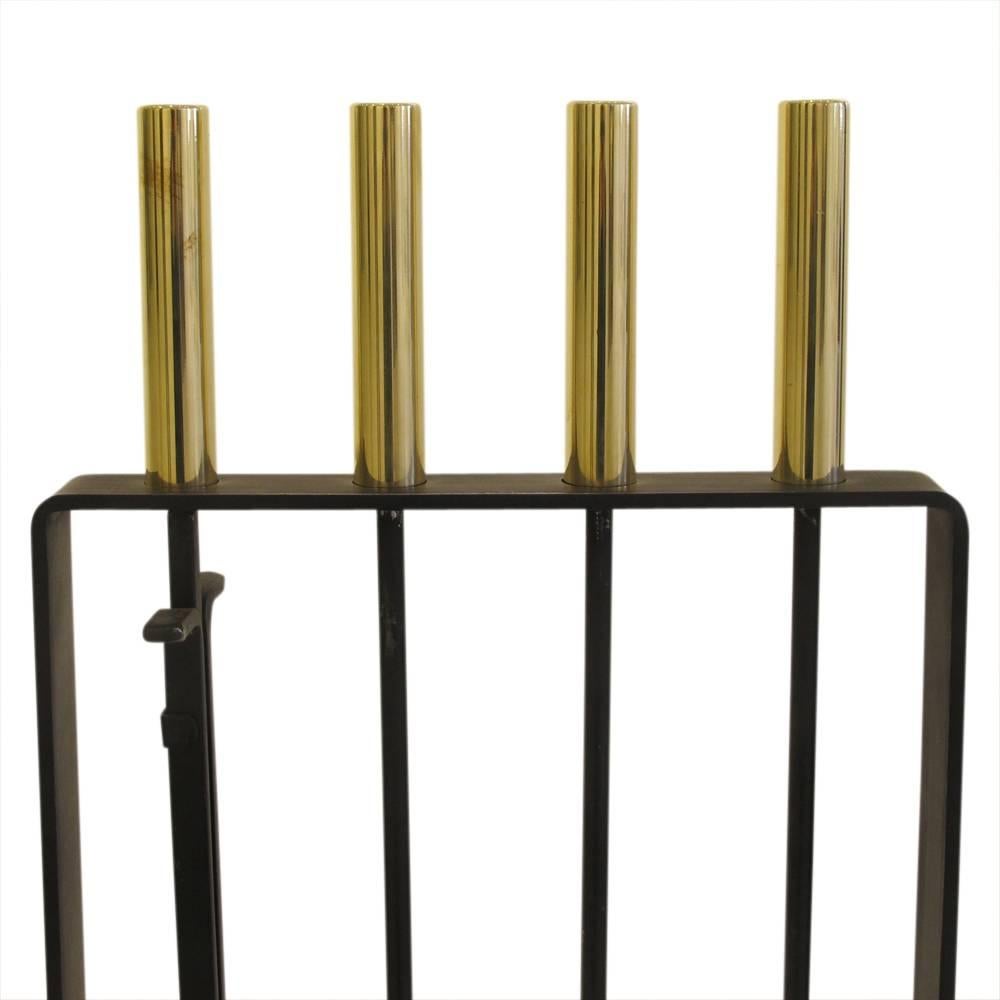 Pilgrim Fireplace Tools Brass and Wrought Iron Signed USA 1970s. In gently used original condition. Minor discoloration to one of the lacquered brass handles. Two pinhole size dents to brass cover on the base and light wear to the tools underneath