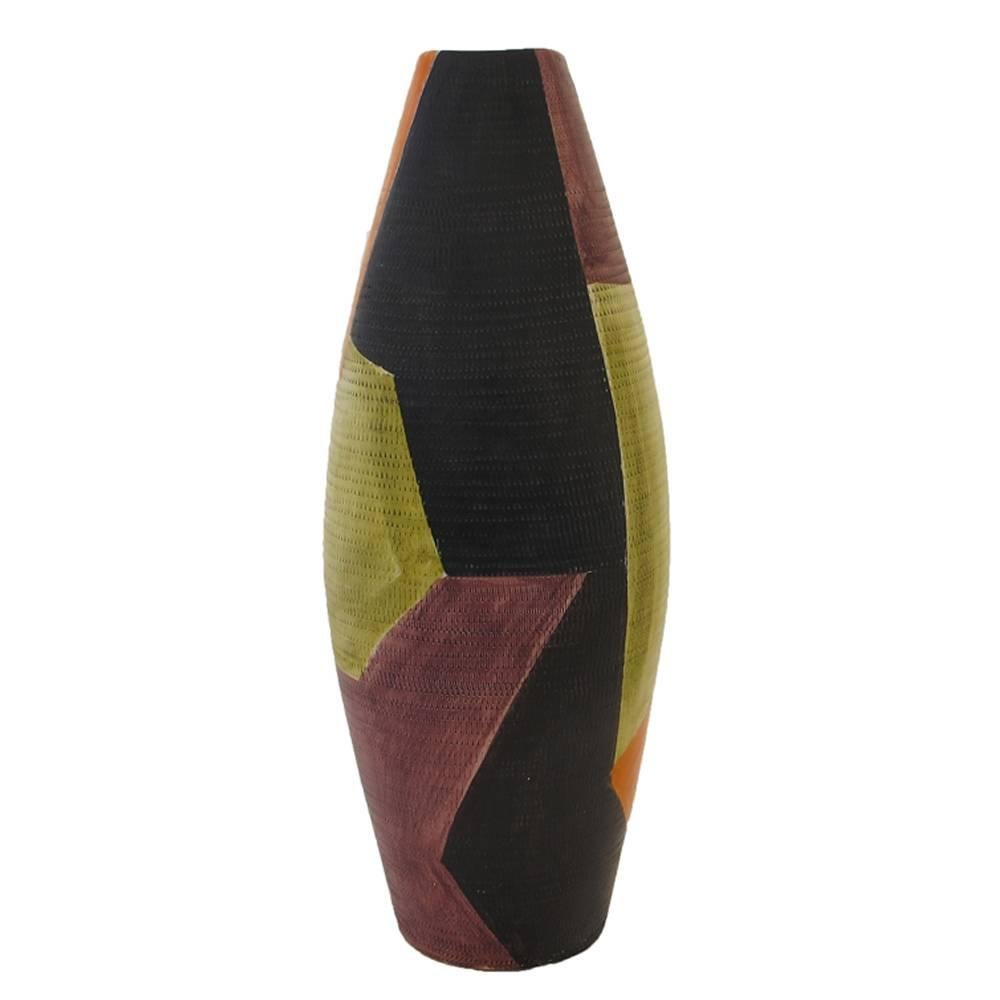 Bitossi Raymor ceramic vase geometric Italy signed, 1950s. Likely designed by Aldo Londi for Bitossi. Colorful tall vase with textured surface and glazed abstract geometric patterns. Retains original Raymor label on bottom which reads: BIT 2323.