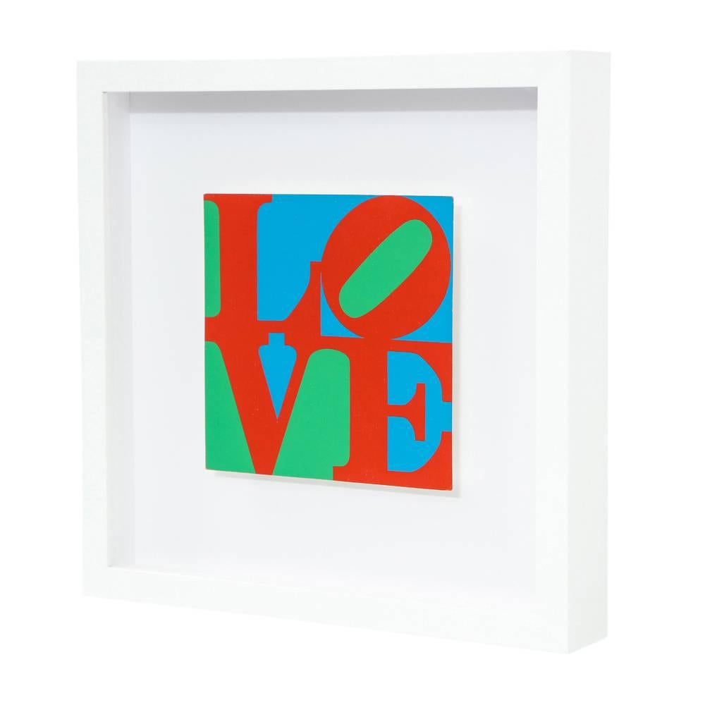 Robert Indiana love screen-print MOMA Pop Art red green blue USA, 1960s. Archivally framed in a 2 inch white lacquered molding with UV Plexi.
Image size 6.25 inches x 6.25 inches. Printed in black ink on verso of print: Robert Indiana: Love 1965.