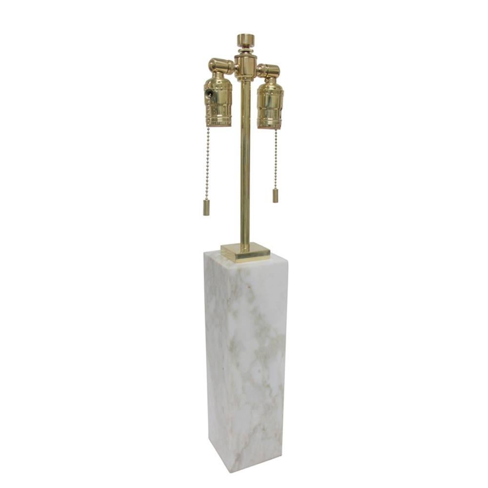 T.H. Robsjohn-Gibbings White Marble and Brass Table Lamp for Hansen USA 1950's. Brass hardware newly re-plated and lamp has been rewired for immediate use. New sockets swivel. Marble base is 12