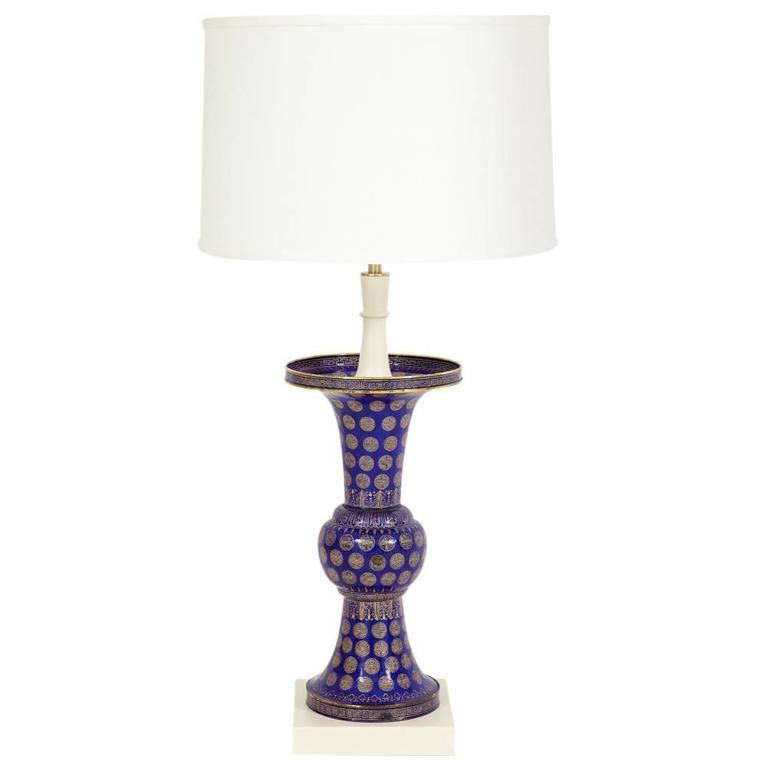Tommi Parzinger table lamps, Chinese cloisonné, enameled brass, signed. Parzinger selected these rich blue/purple 19th Century cloisonné brass baluster vases to be presented as lamps in the Ocean, New Jersey home of Nathan and Janet Appleman in