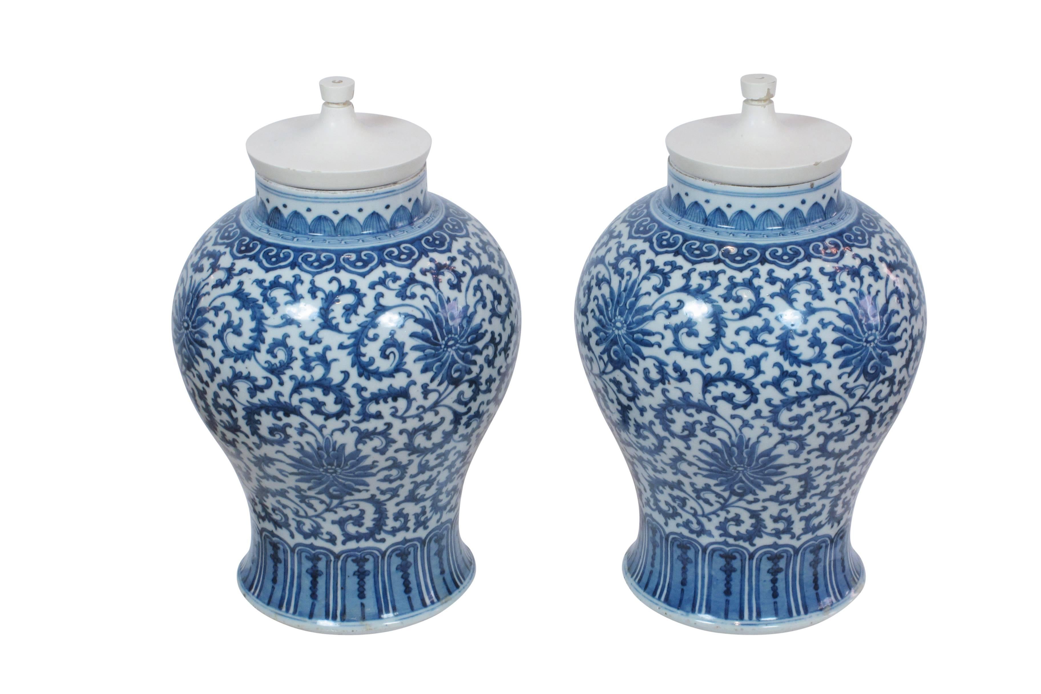 Chinese Porcelain Vases by Tommi Parzinger Blue and White Porcelain USA 1950's. As was often was the case, Parzinger repurposed or modified items made by others and incorporated them into his interiors. Parzinger selected these handsome blue and