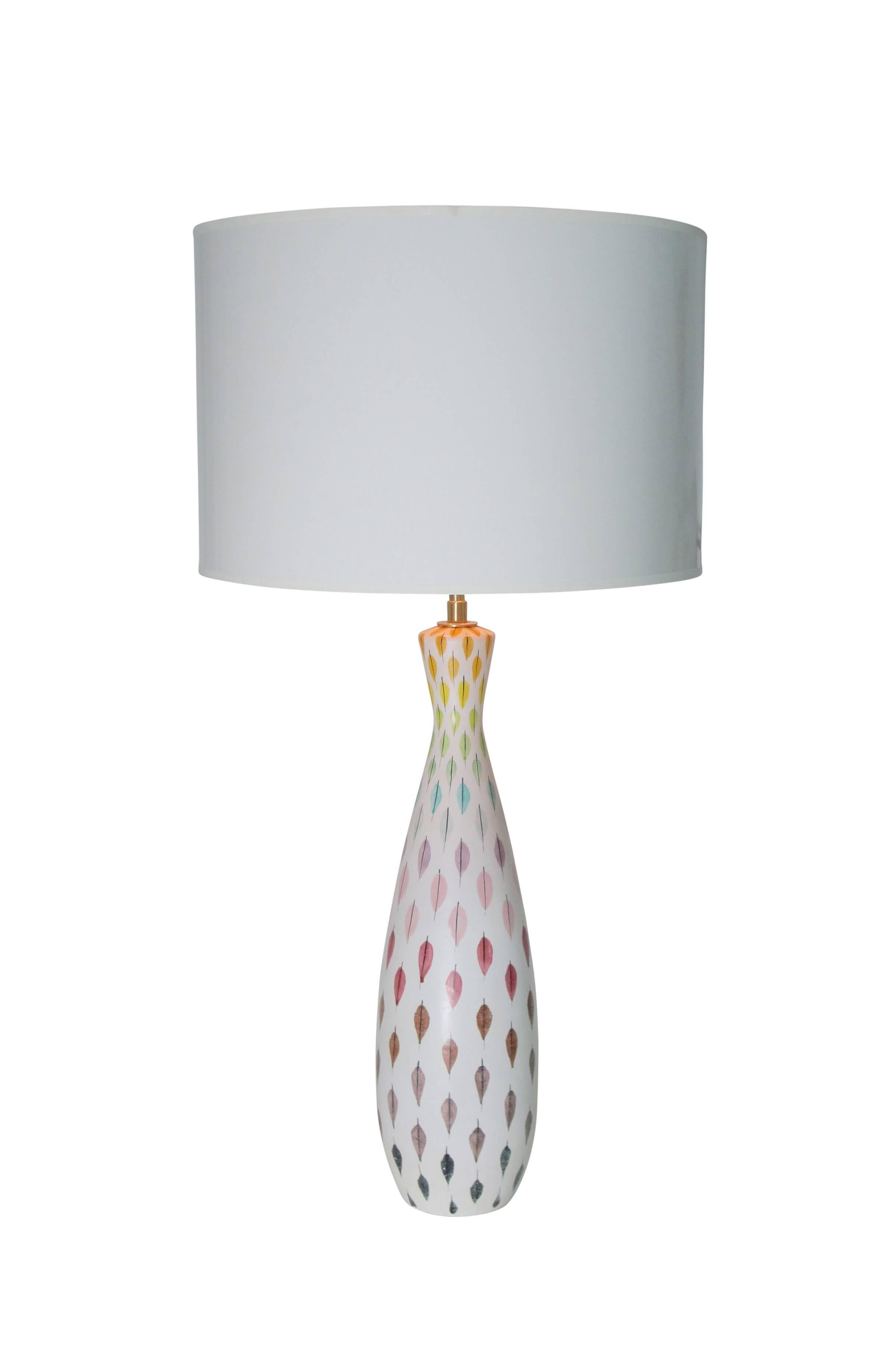 Bitossi Raymor ceramic feather Piume multi-color lamps pair signed, Italy, 1950s. Aldo Londi for Bitossi bowling pin form ceramic lamps decorated with multi-color feather pattern. Bright colors. Height of the ceramic: 18 inches. Rewired with new